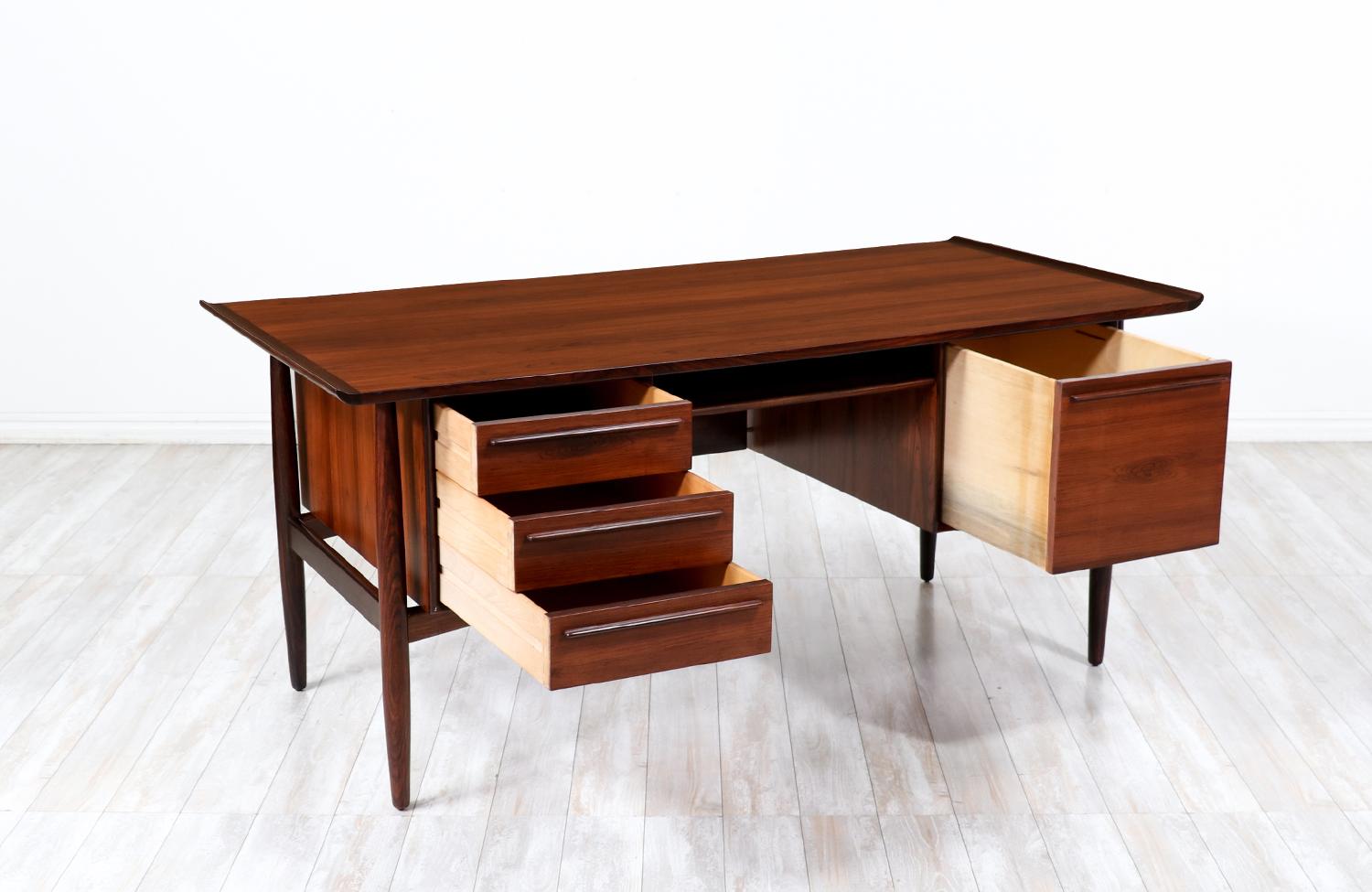 Expertly Restored -Danish Modern Executive Sculpted Rosewood Desk by H.P. Hansen In Excellent Condition For Sale In Los Angeles, CA