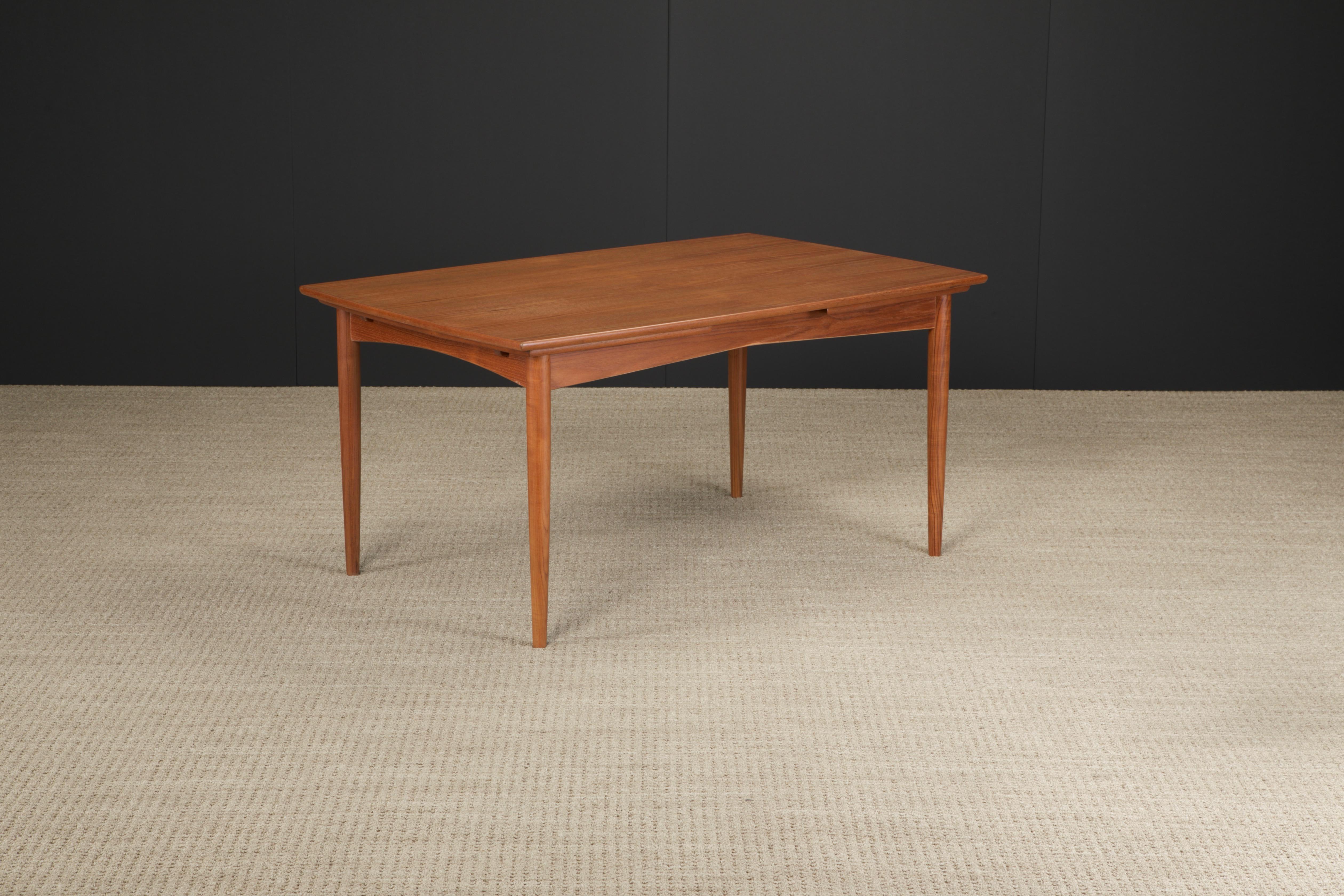 This teak Mid-Century Modern dining table is the perfect staple for any modern dining room. Expandable with nifty built-in leaves, this table can comfortably seat four (4) when collapsed and six (6) people when extended. Can squeeze in eight (8)