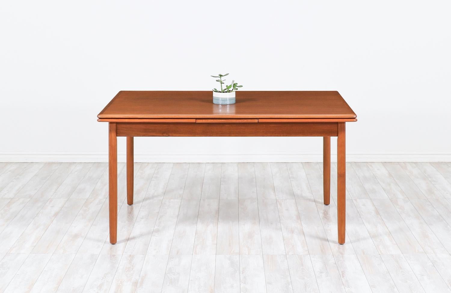 Mid-Century Modern Danish Modern Expanding Draw-Leaf Teak Dining Table