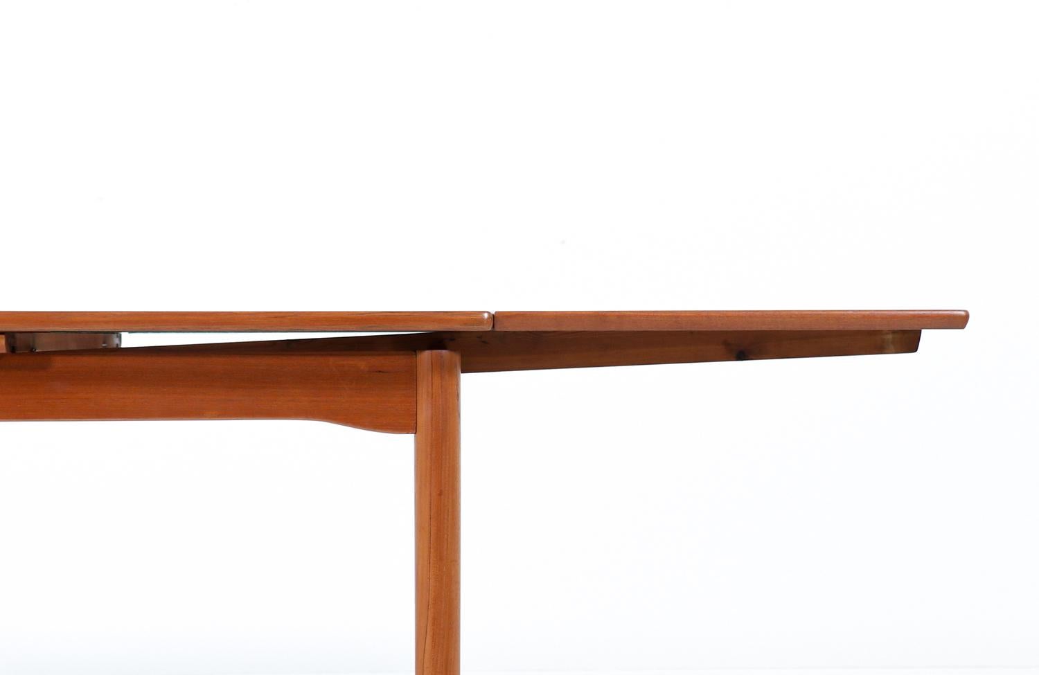Mid-Century Modern Danish Modern Teak Dining Table with Expanding Draw-Leaves For Sale