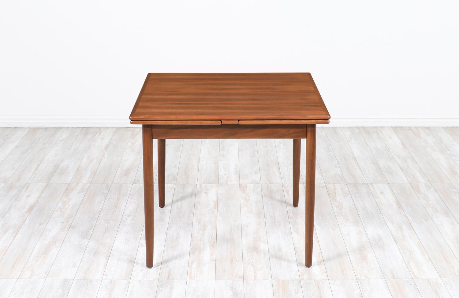 Mid-Century Modern Danish Modern Expanding Draw-Leaf Walnut Dining Table