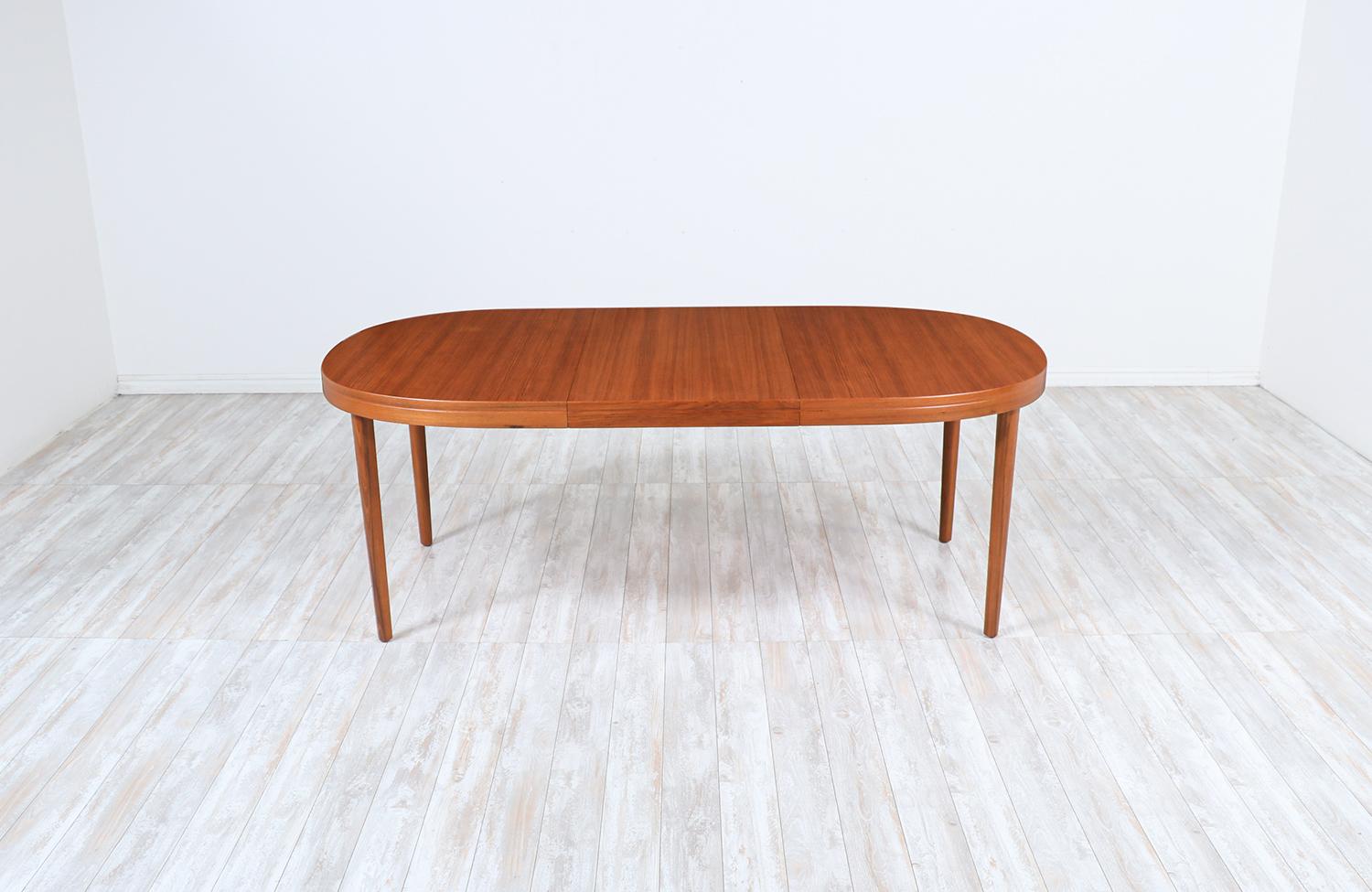 Mid-20th Century Danish Modern Expanding Oval Teak Dining Table