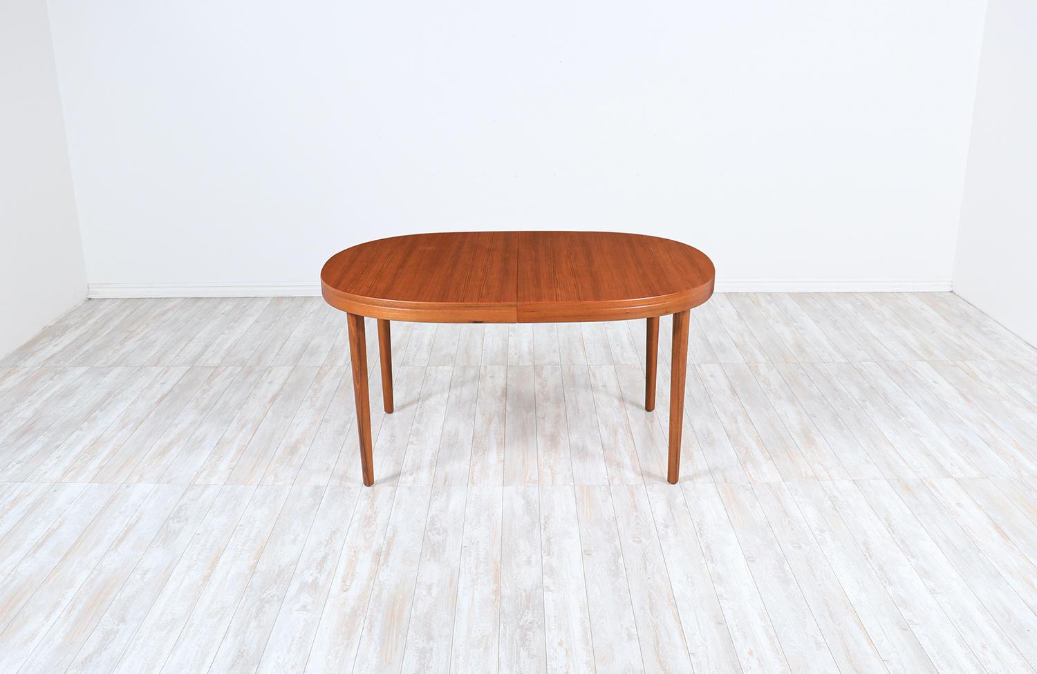 Danish Modern Expanding Oval Teak Dining Table 1