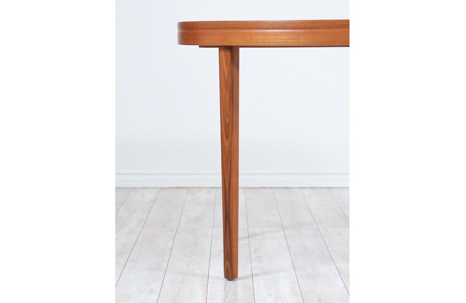 Danish Modern Expanding Oval Teak Dining Table 2