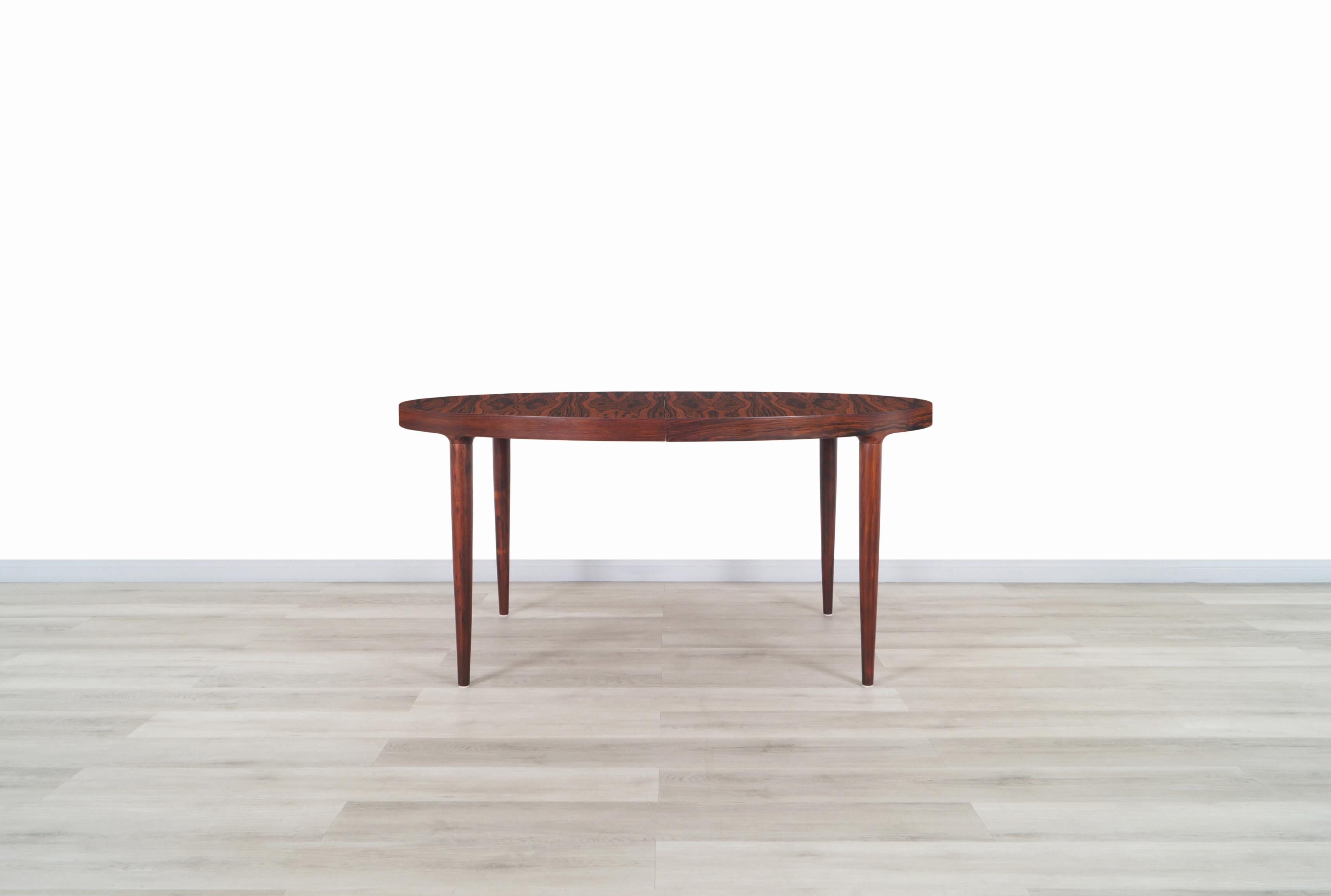 Danish Modern Expanding Rosewood Dining Table by Moreddi In Excellent Condition In North Hollywood, CA