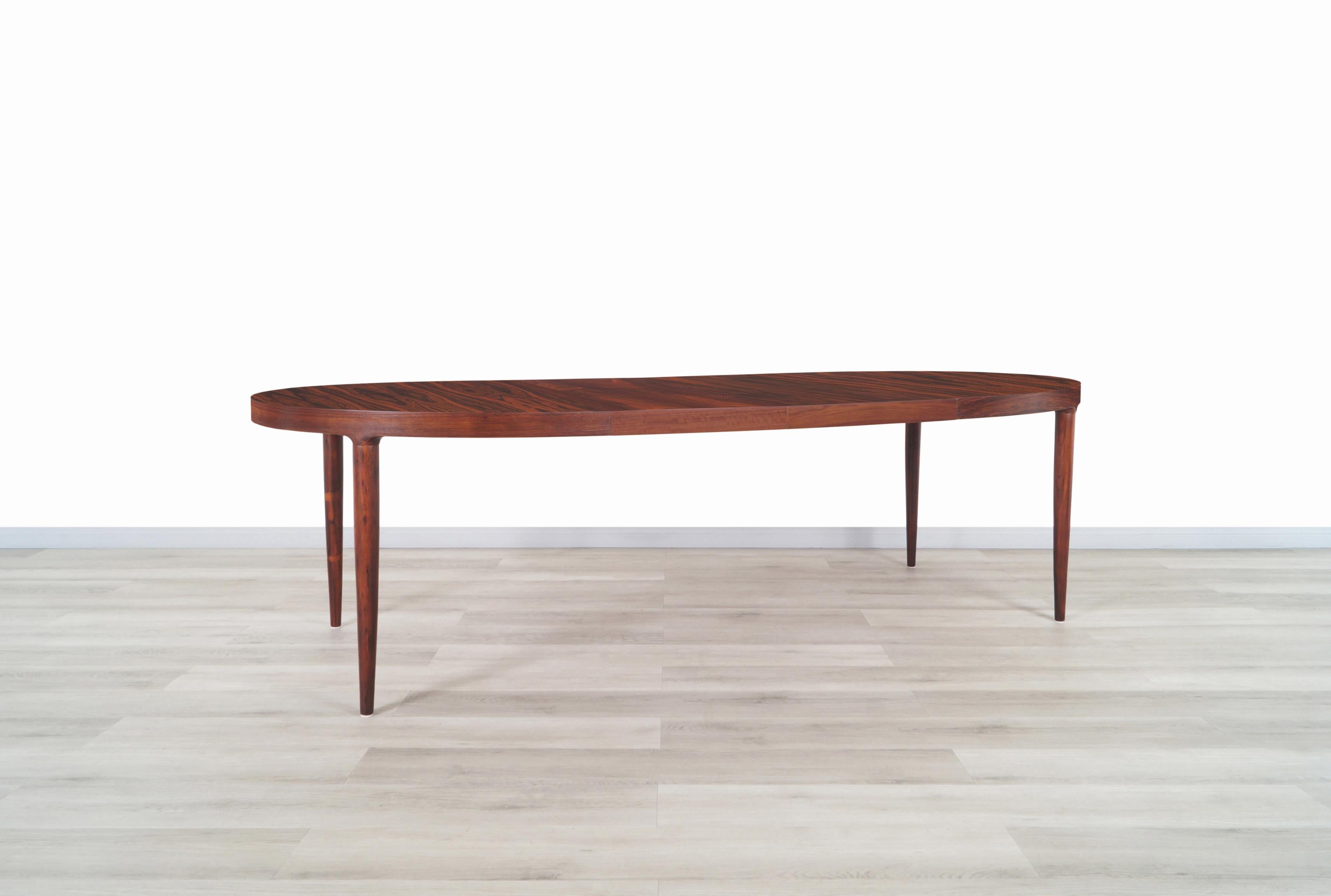 Danish Modern Expanding Rosewood Dining Table by Moreddi 2