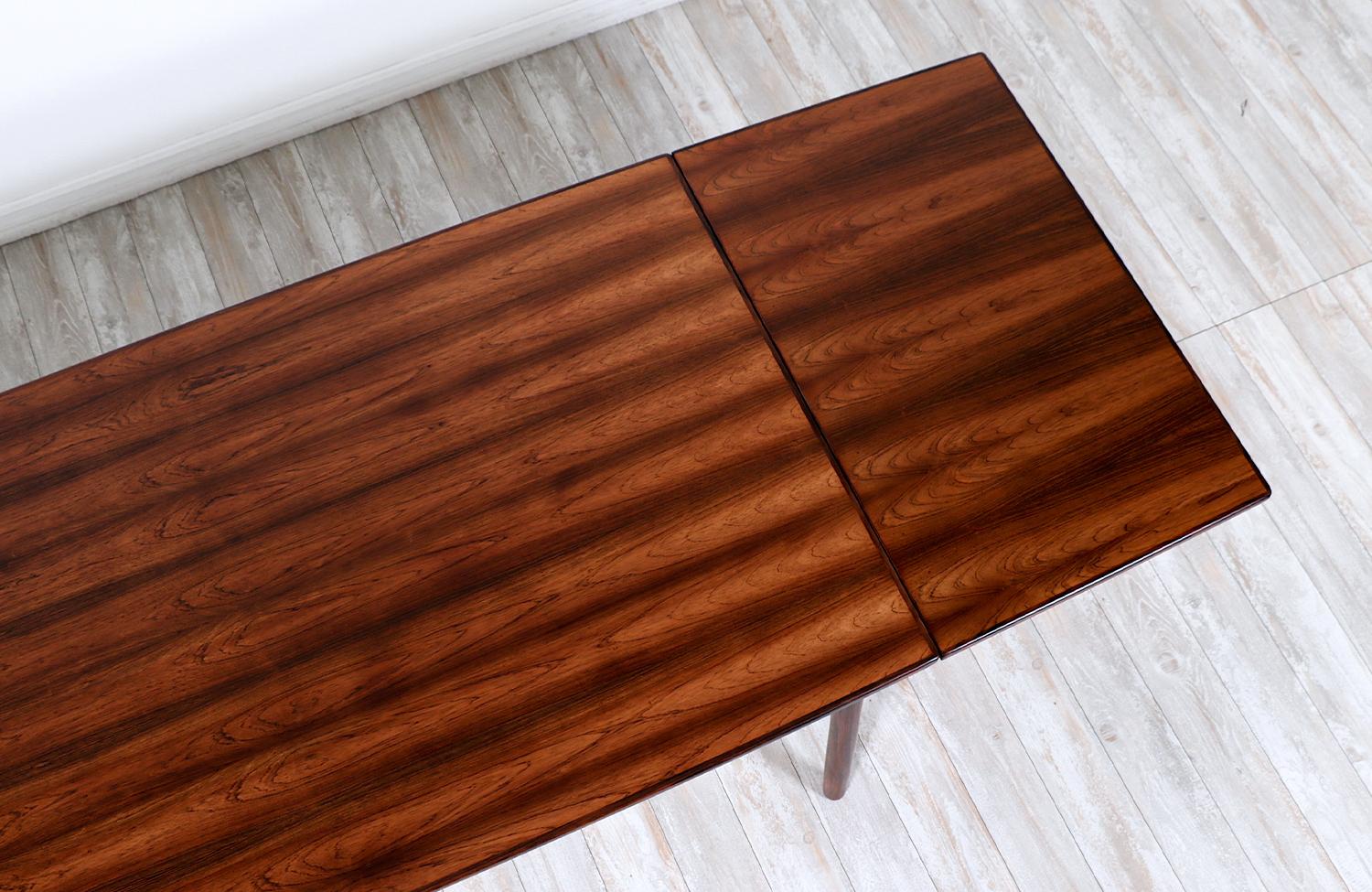 Wood Danish Modern Expanding Rosewood Dining Table by Randers Mobelfabrik