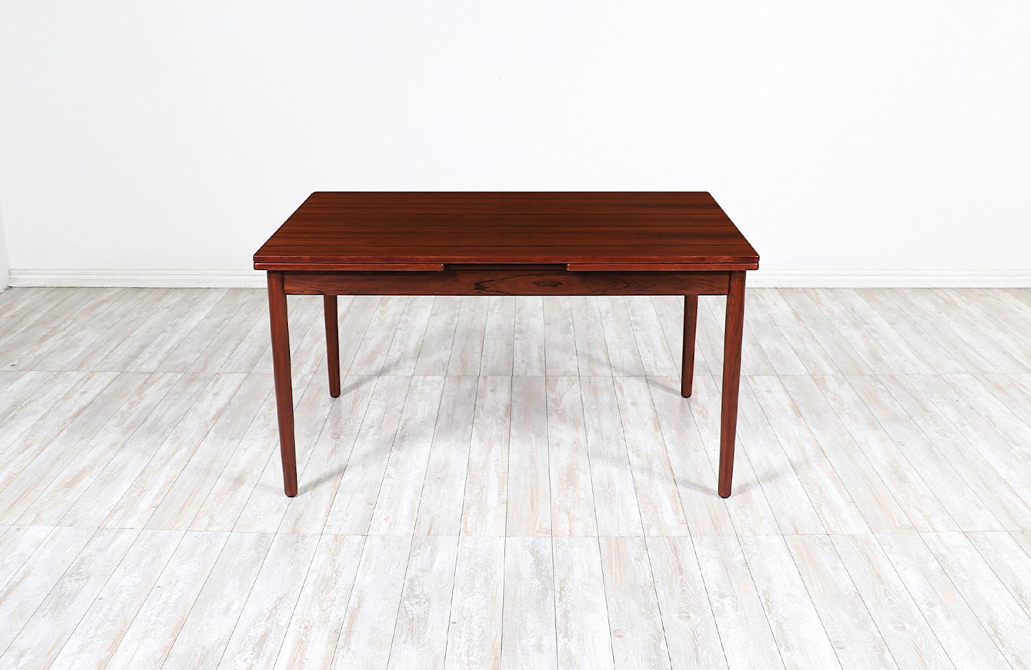 Mid-Century Modern Danish Modern Expanding Rosewood Dining Table with Draw-Leaves