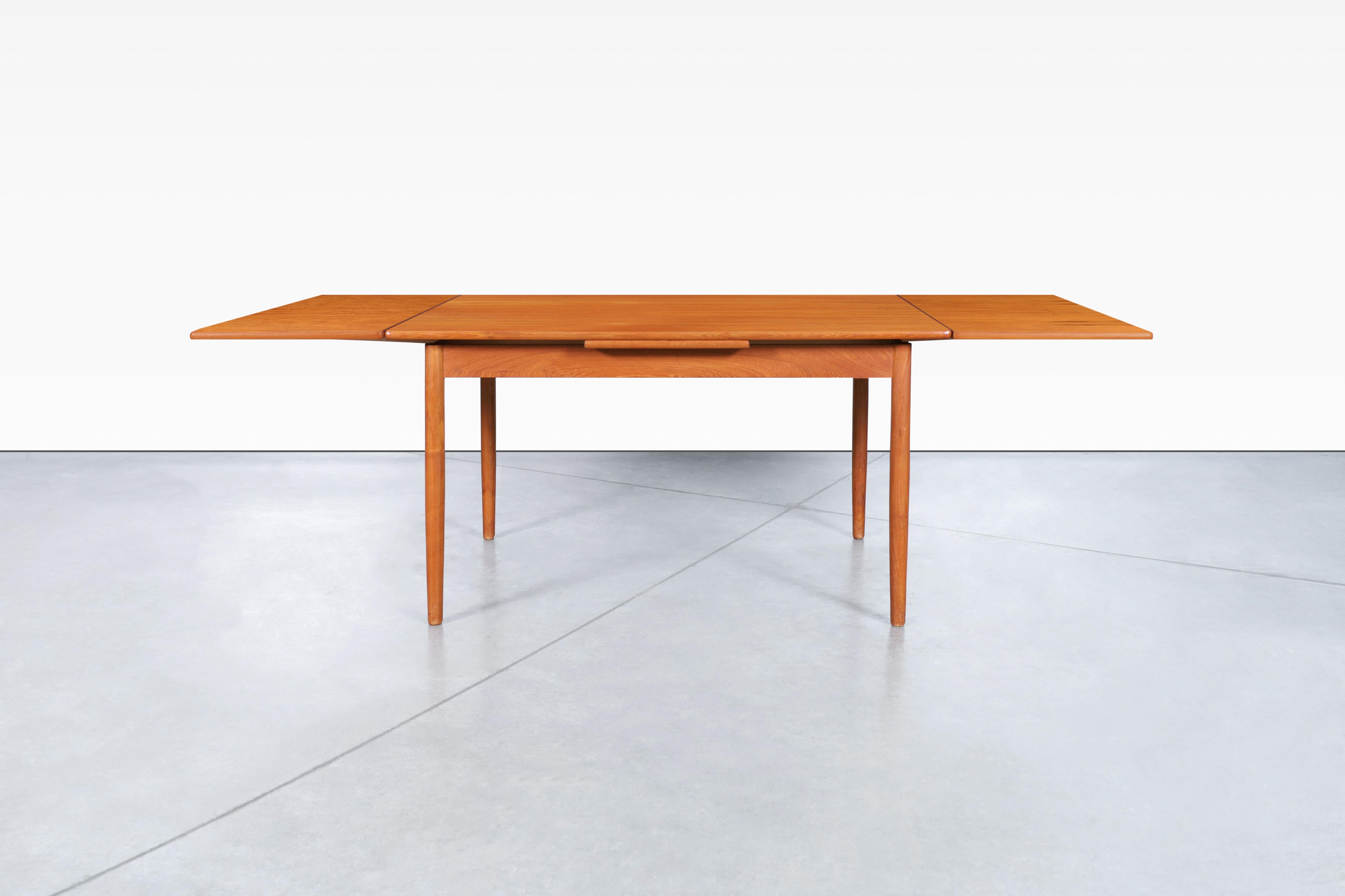 Danish Modern Expanding Teak Dining Table by AM Møble 2