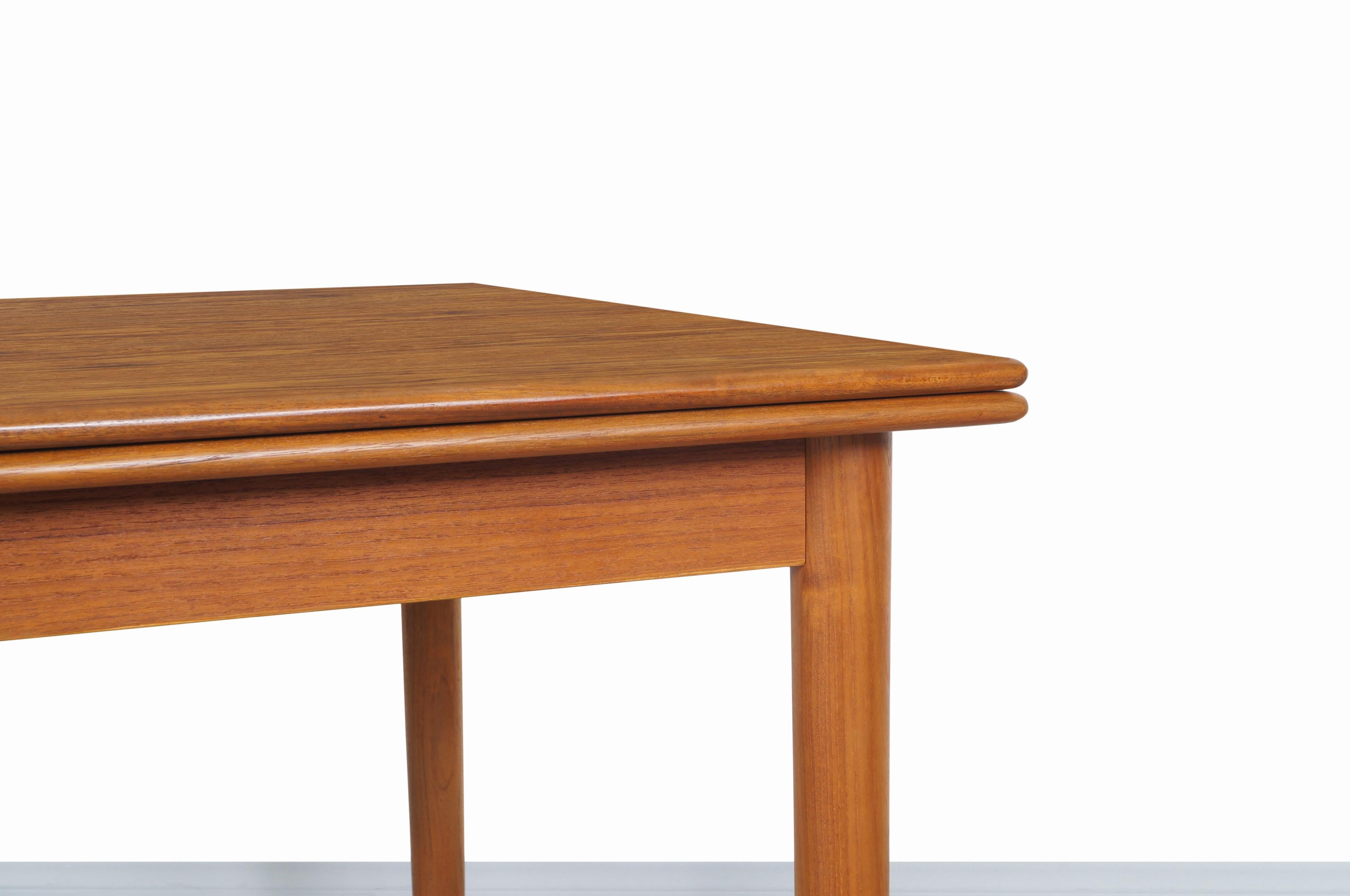 Mid-Century Modern Danish Modern Expanding Teak Dining Table by AM Møbler