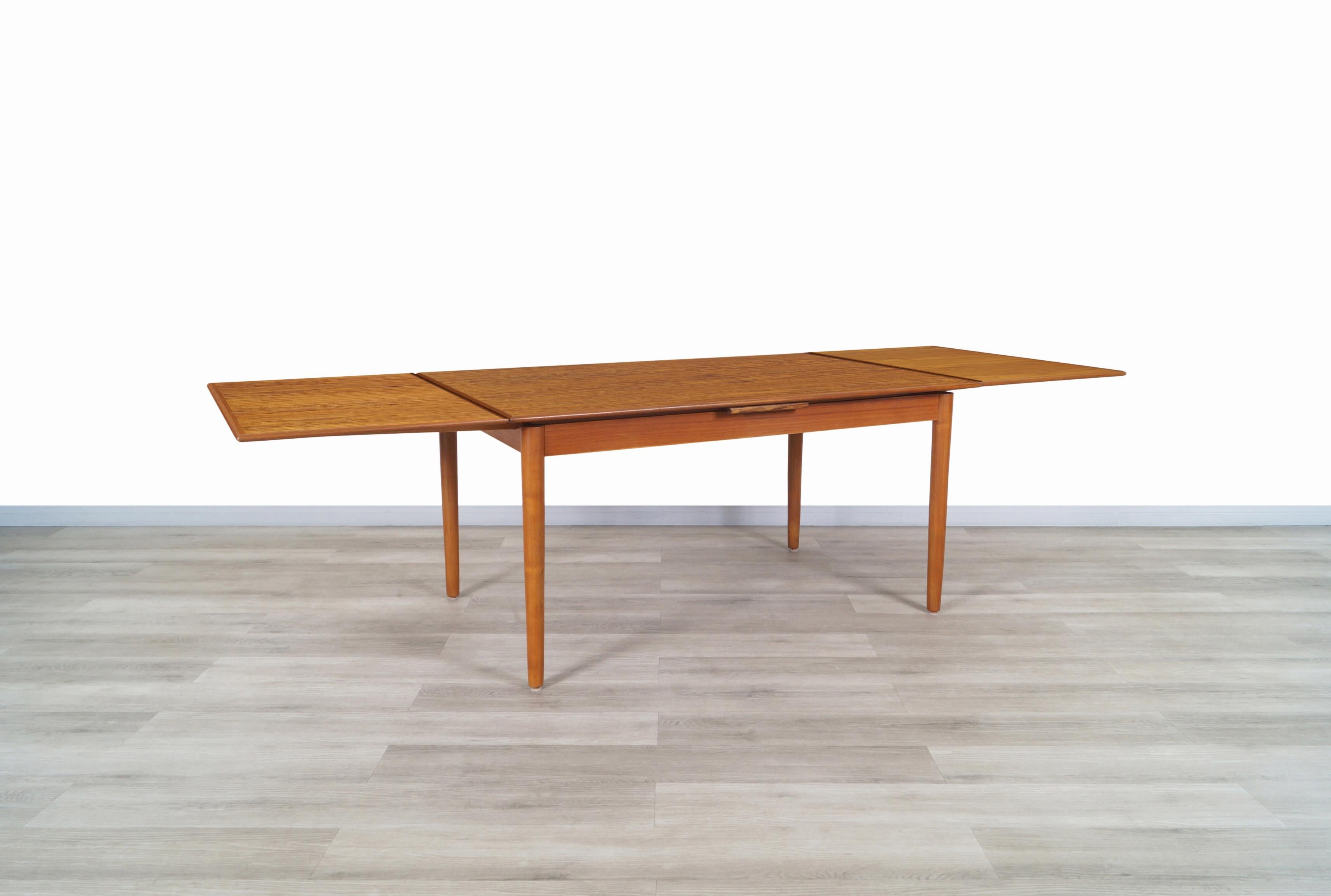 Danish Modern Expanding Teak Dining Table by AM Møbler 2