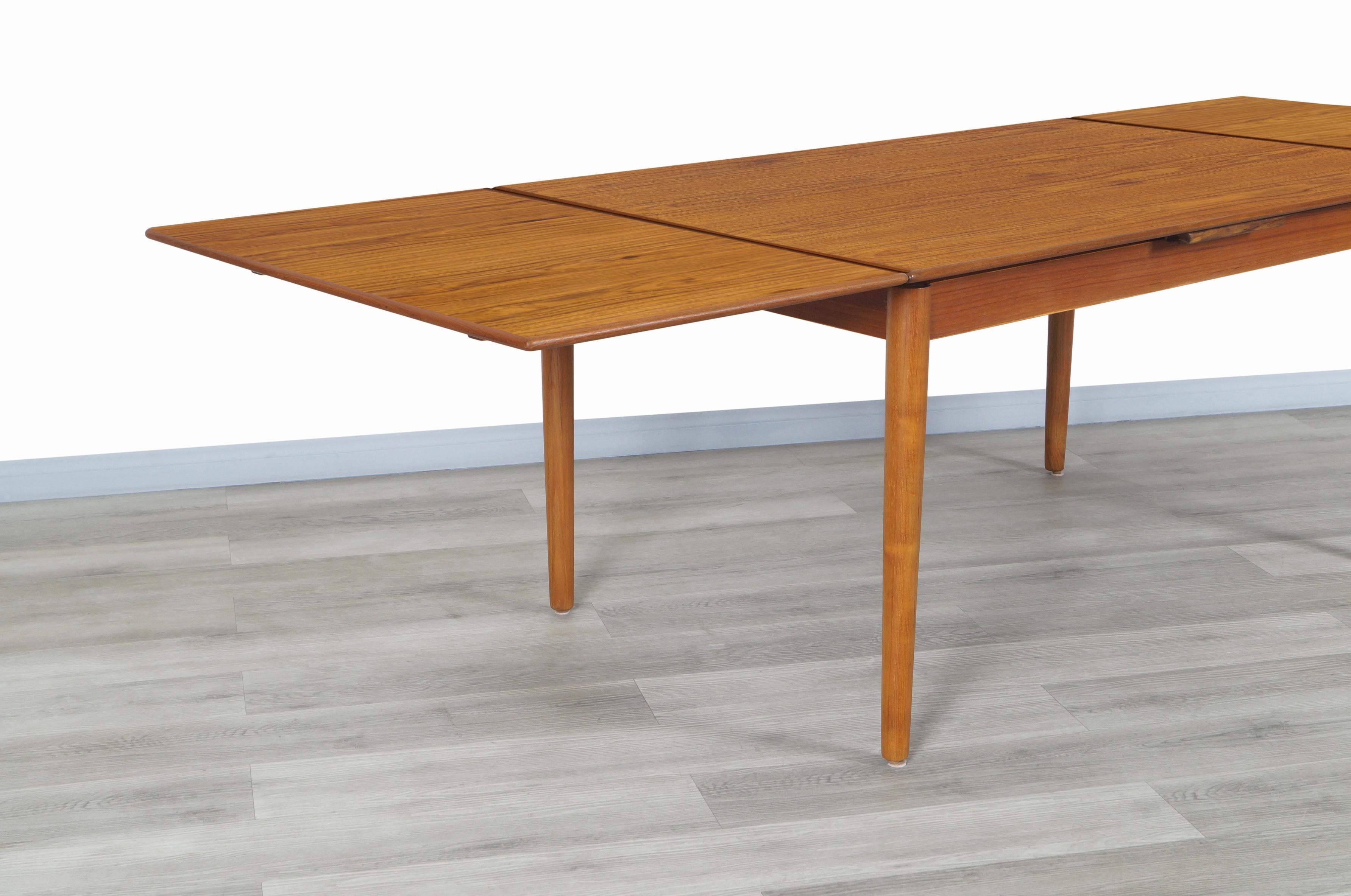 Danish Modern Expanding Teak Dining Table by AM Møbler 4