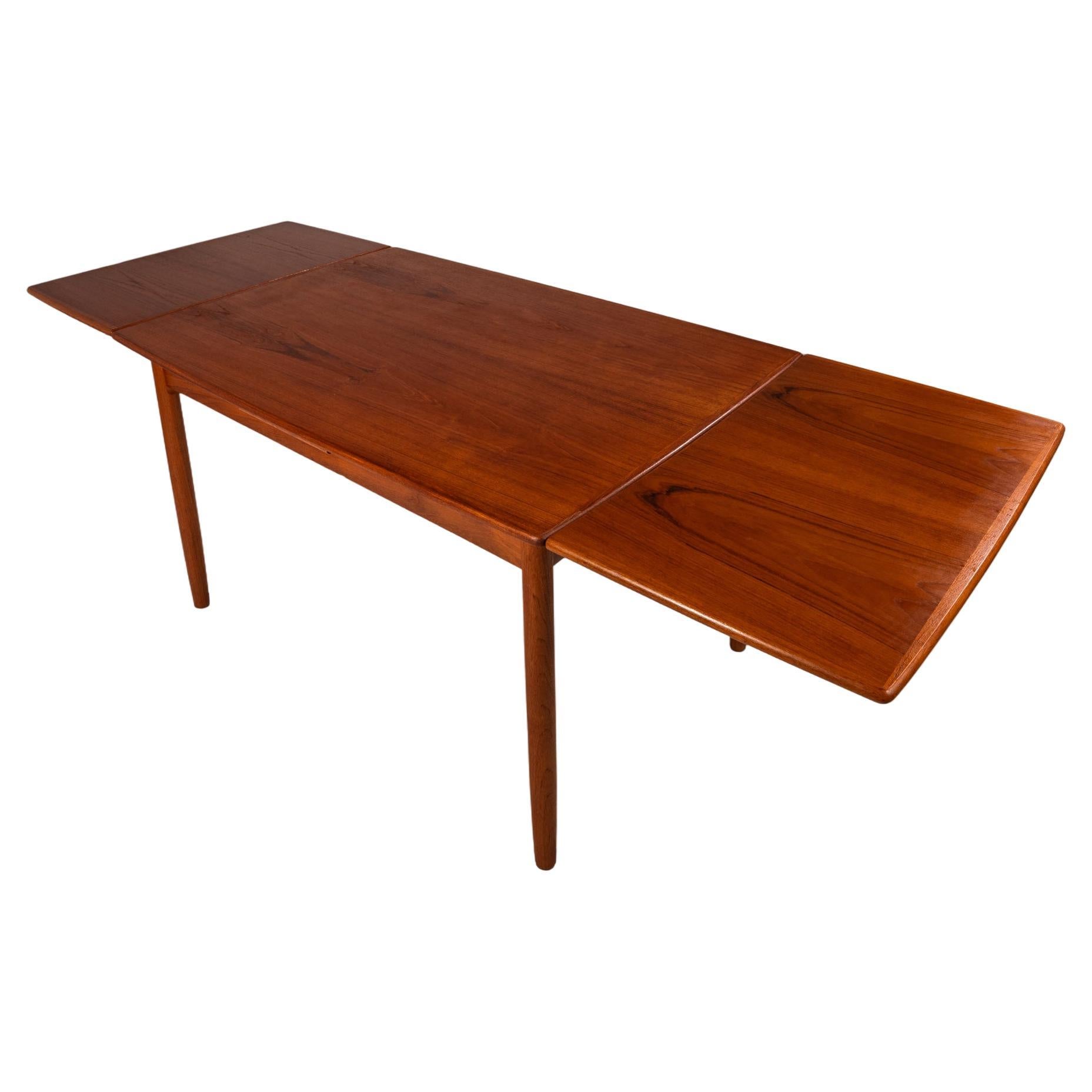 Danish Modern Expansion Dining Table in Teak w/ Stow-In-Table Leaves, c. 1960s For Sale