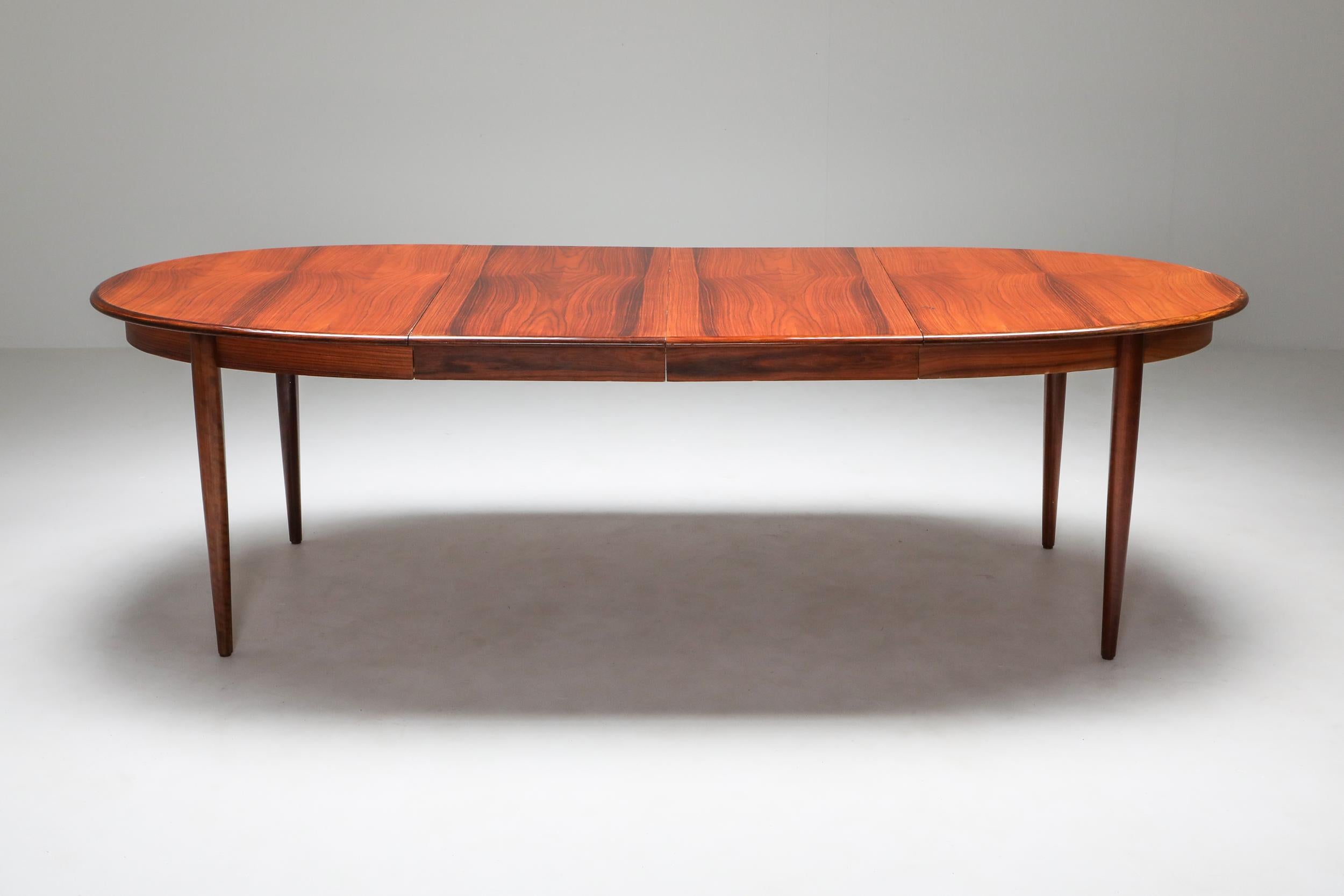 Niels Moller, rosewood, Scandinavian Modern, extendable, dining table

Round dining table with two extension leaves. Fits 8 to 10 people
Niels Møller model 82 dining chairs, 1970 set of 6 rosewood dining chairs designed by Niels O. Møller for