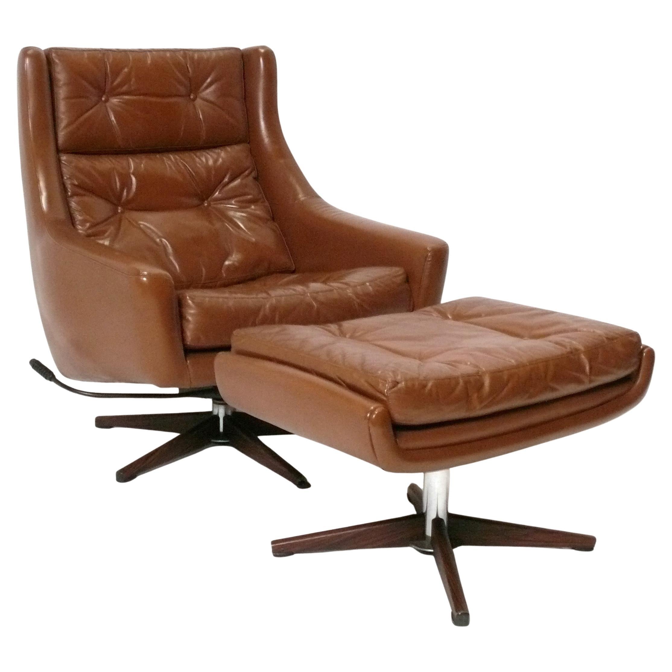 Danish Modern Faux Leather Lounge Chair and Ottoman circa 1960s For Sale