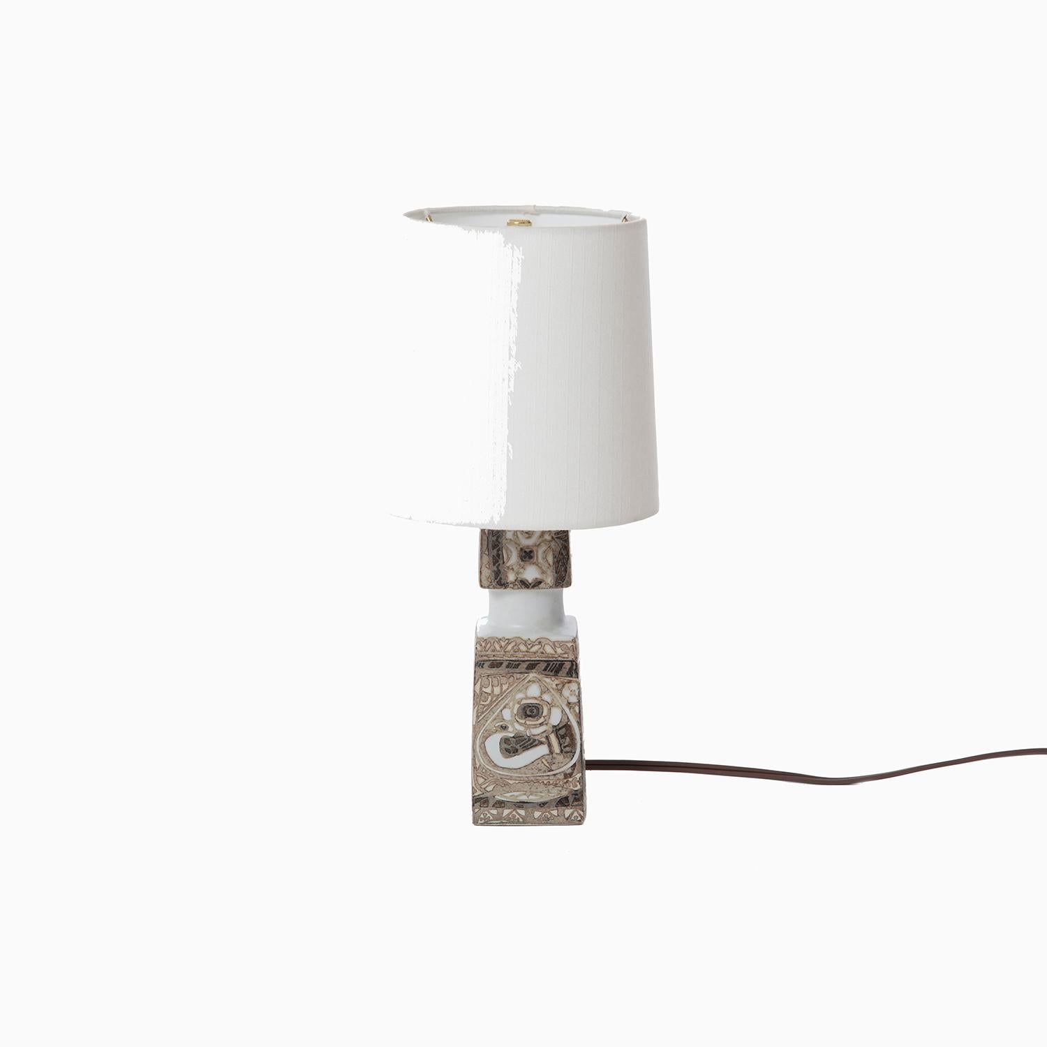 Danish modern Royal Copenhagen pottery lamp designed by Nils Thorsson for Føg & Morup.


Professional, skilled furniture restoration is an integral part of what we do every day. Our goal 
is to provide beautiful, functional furniture that honors