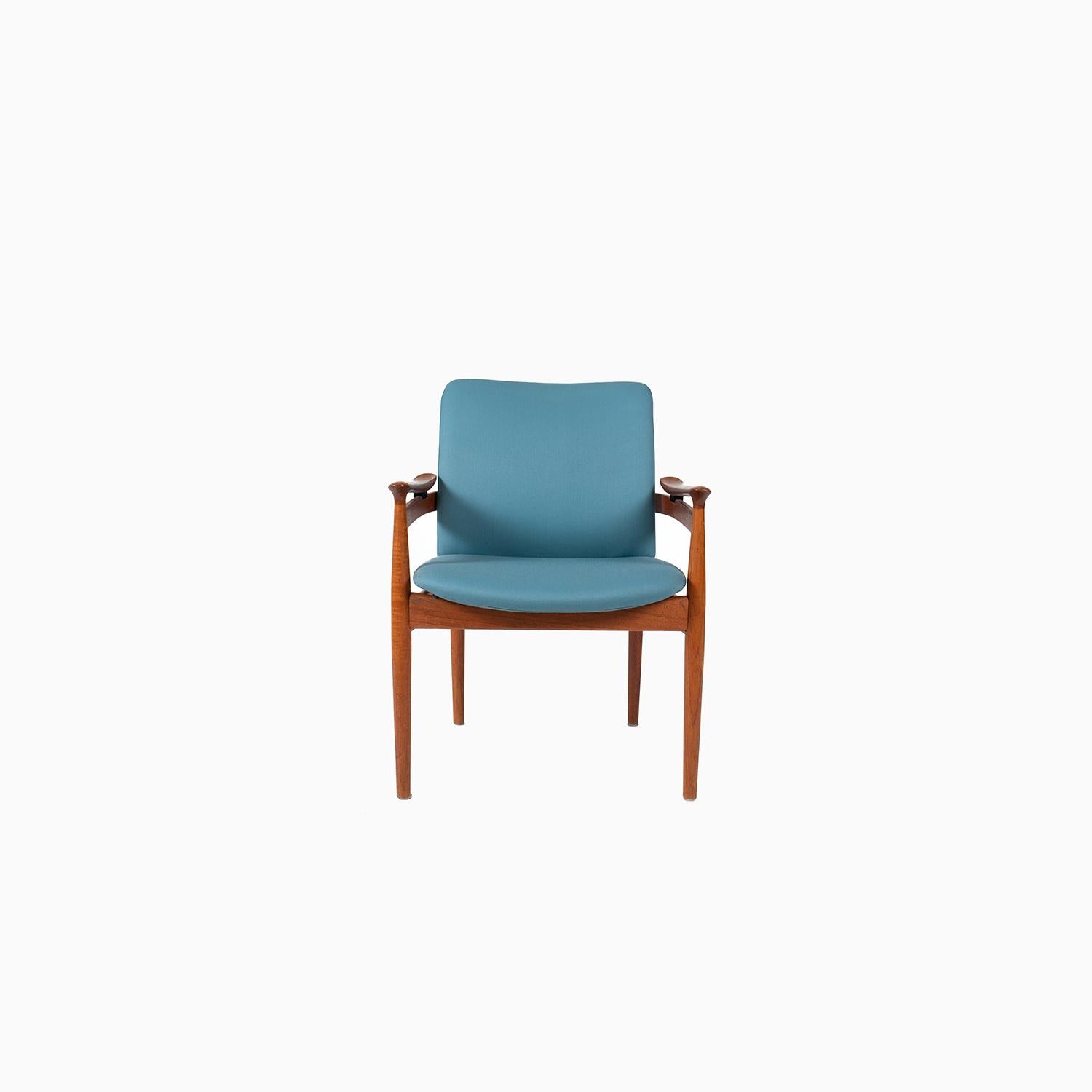 Finn Juhl Model 192 armchair in teak. Light blue upholstered seat and seat back. 


Professional, skilled furniture restoration is an integral part of what we do every day. Our goal 
is to provide beautiful, functional furniture that honors its