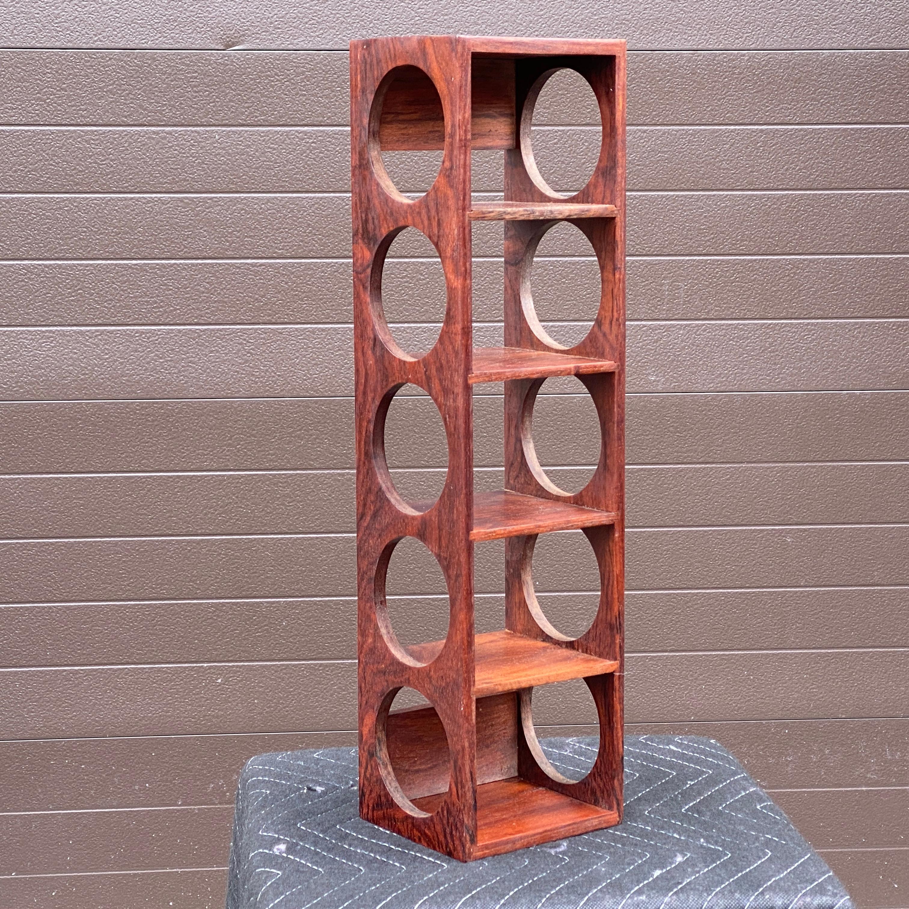 Vintage Danish Modern Five Bottle Solid Rosewood Wall-Mounted Wine Rack
Unmarked but has been attributed to Dansk.