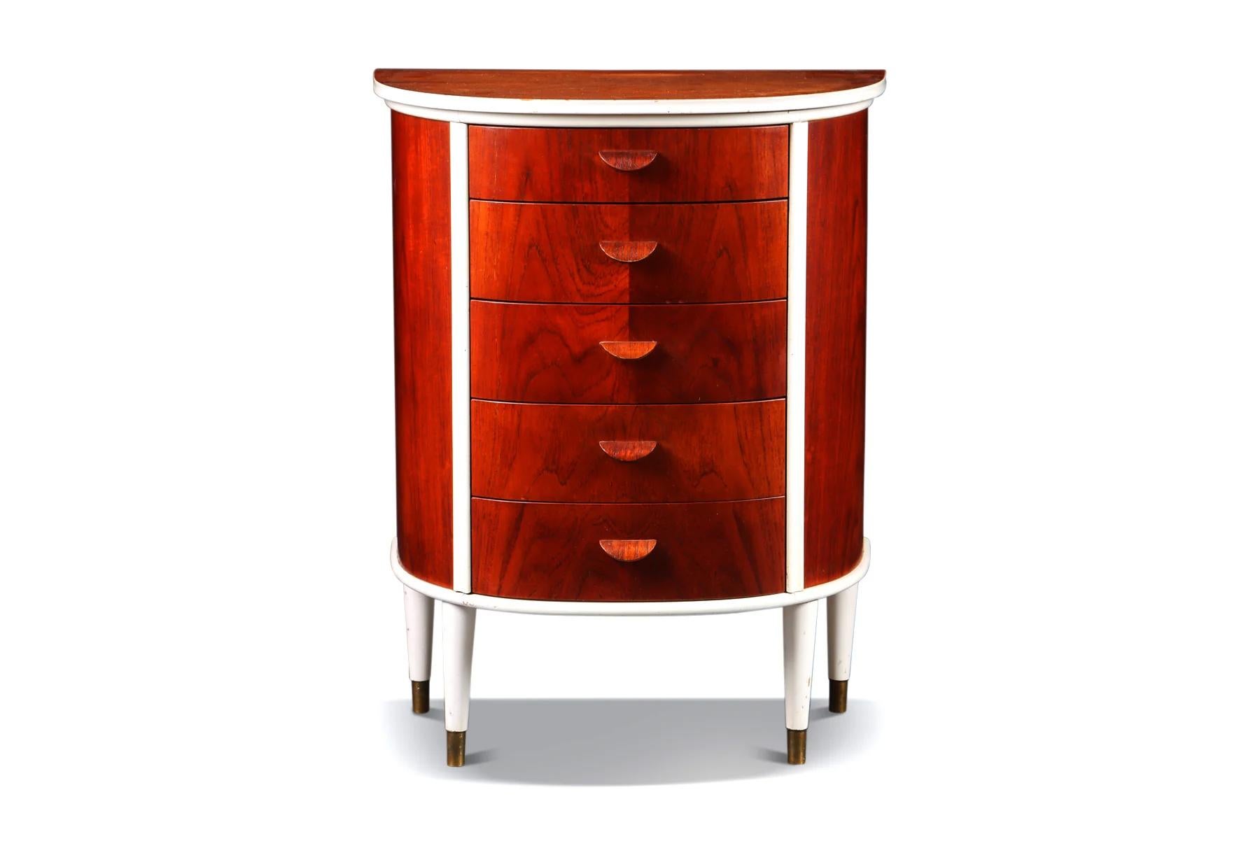 Origin: Denmark
Designer: Unknown
Manufacturer: Unknown
Era: 1960s
Materials: Teak, Lacquer
Measurements: 25″ wide x 14.5″ deep x 32.25″ tall

Condition: In excellent original condition with typical wear for its vintage. Price includes restoration /