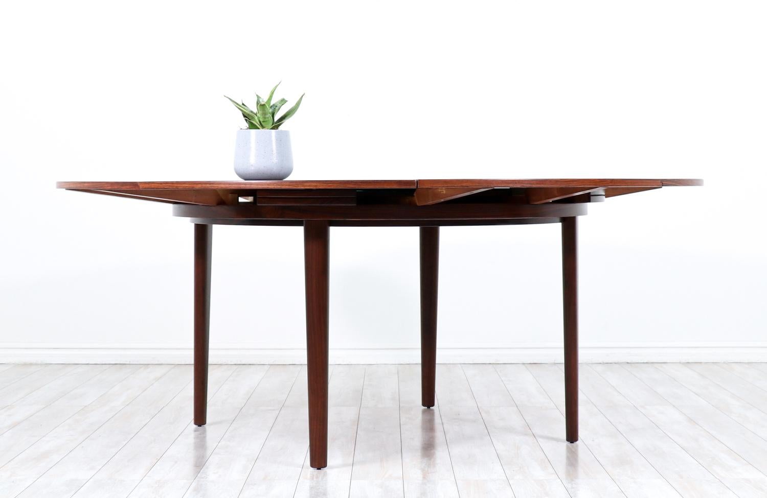 Mid-20th Century Danish Modern “Flip-Flap” Expanding Rosewood Dining Table by Dyrlund