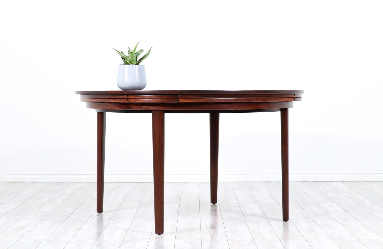 Brass Danish Modern “Flip-Flap” Expanding Rosewood Dining Table by Dyrlund