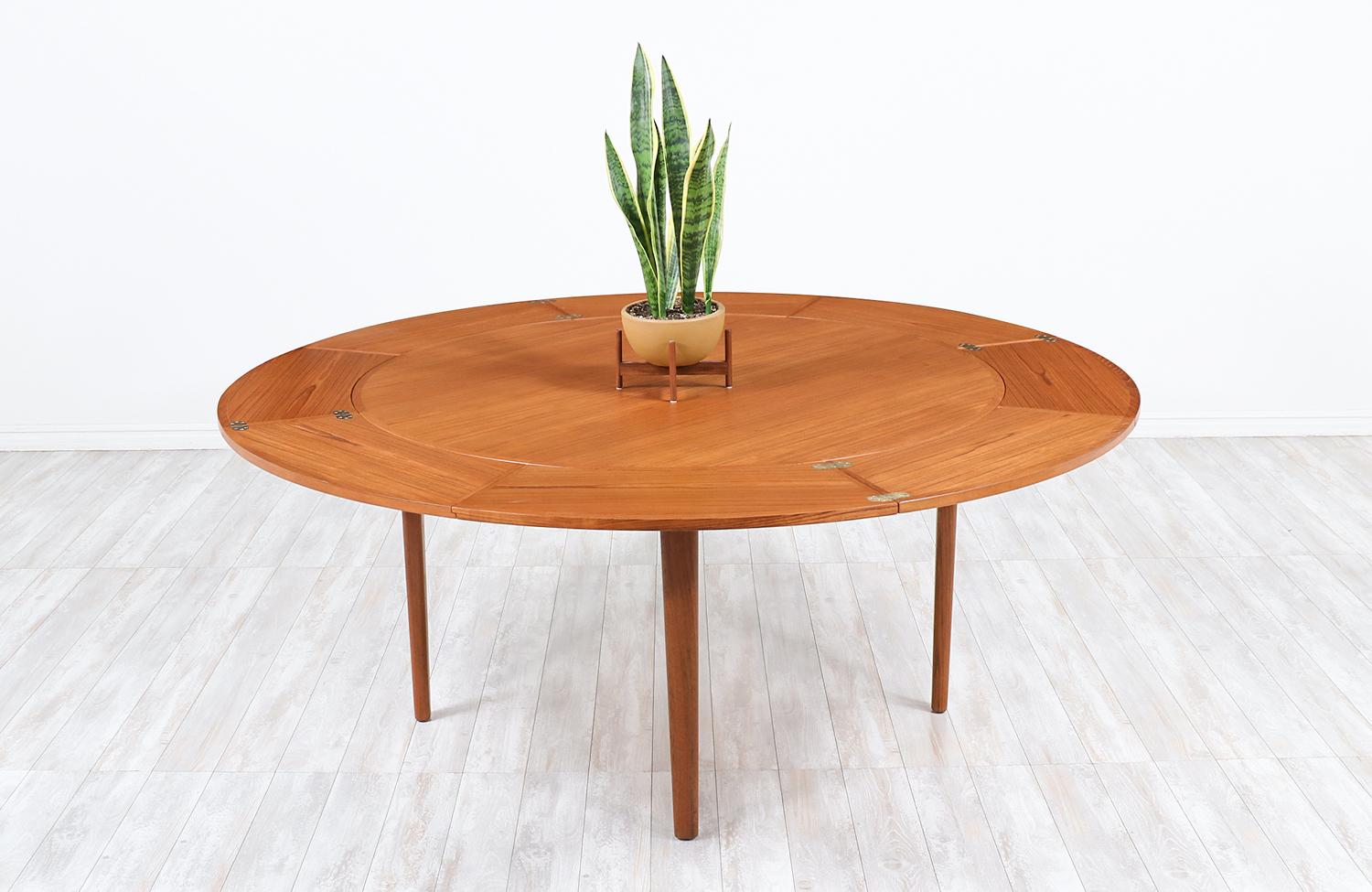 Danish Modern “Flip-Flap” Expanding Teak Dining Table by Dyrlund In Excellent Condition In Los Angeles, CA