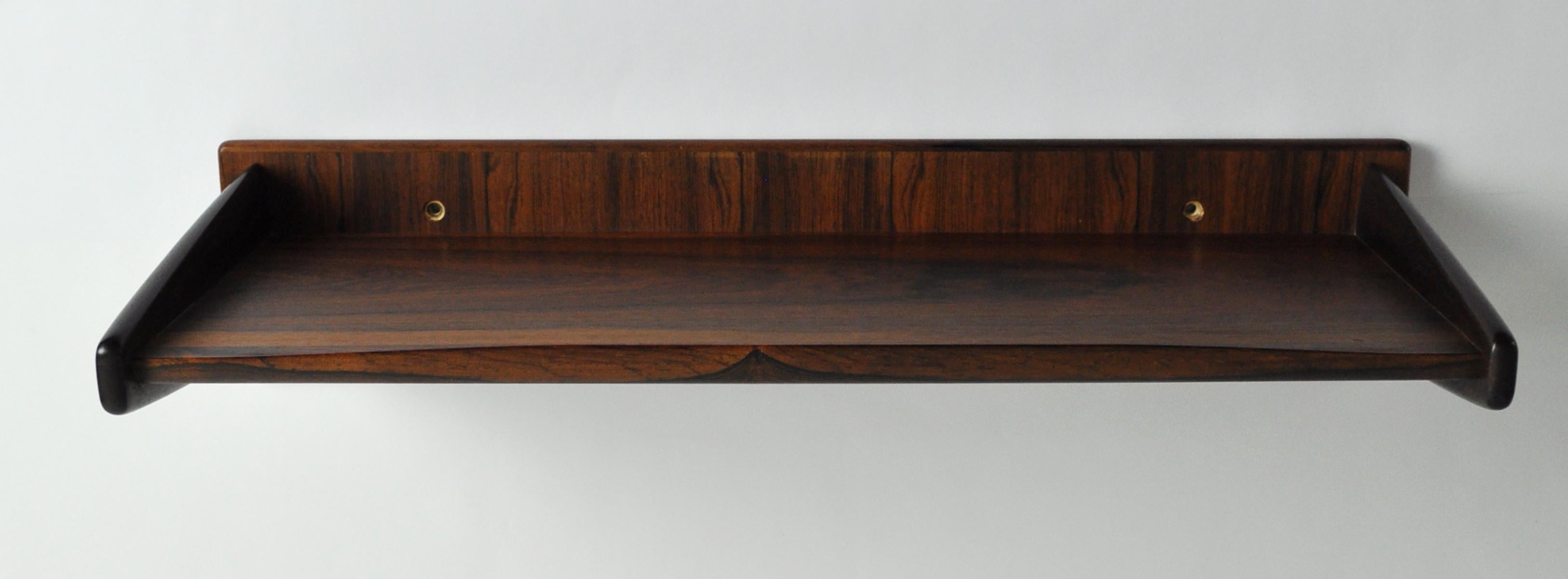 Wall hanging Danish Modern Console in Brazillian Rosewood by Melvin Mikkelsen Møbler, Denmark. Labeled by the maker and Danish Furniture Makers.