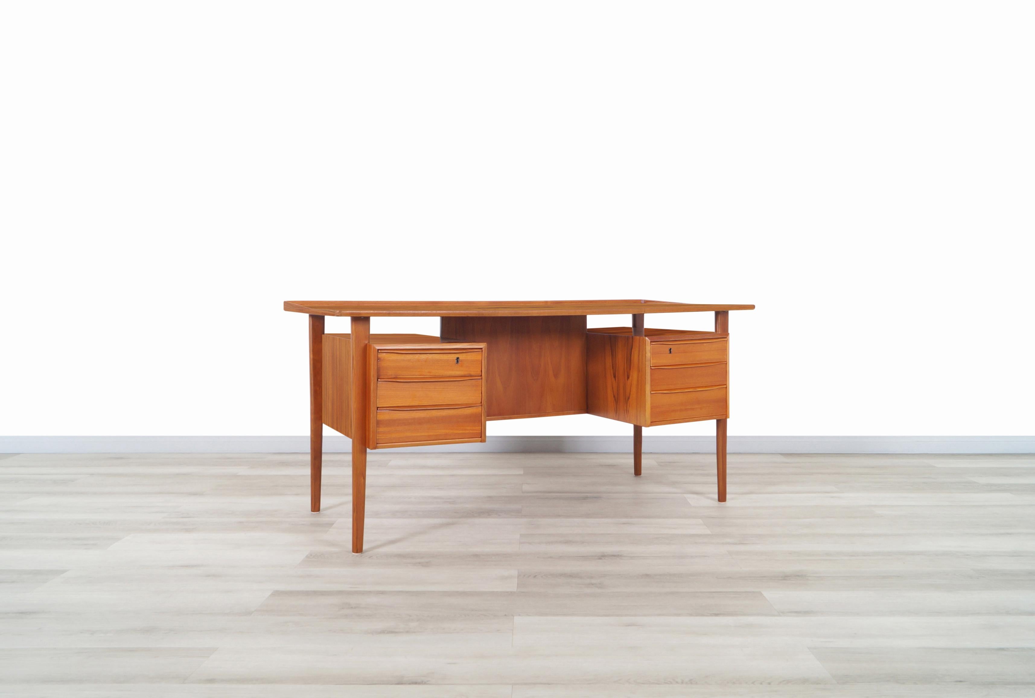 Mid-Century Modern Danish Modern Floating Top Teak Desk by Peter Løvig Nielsen