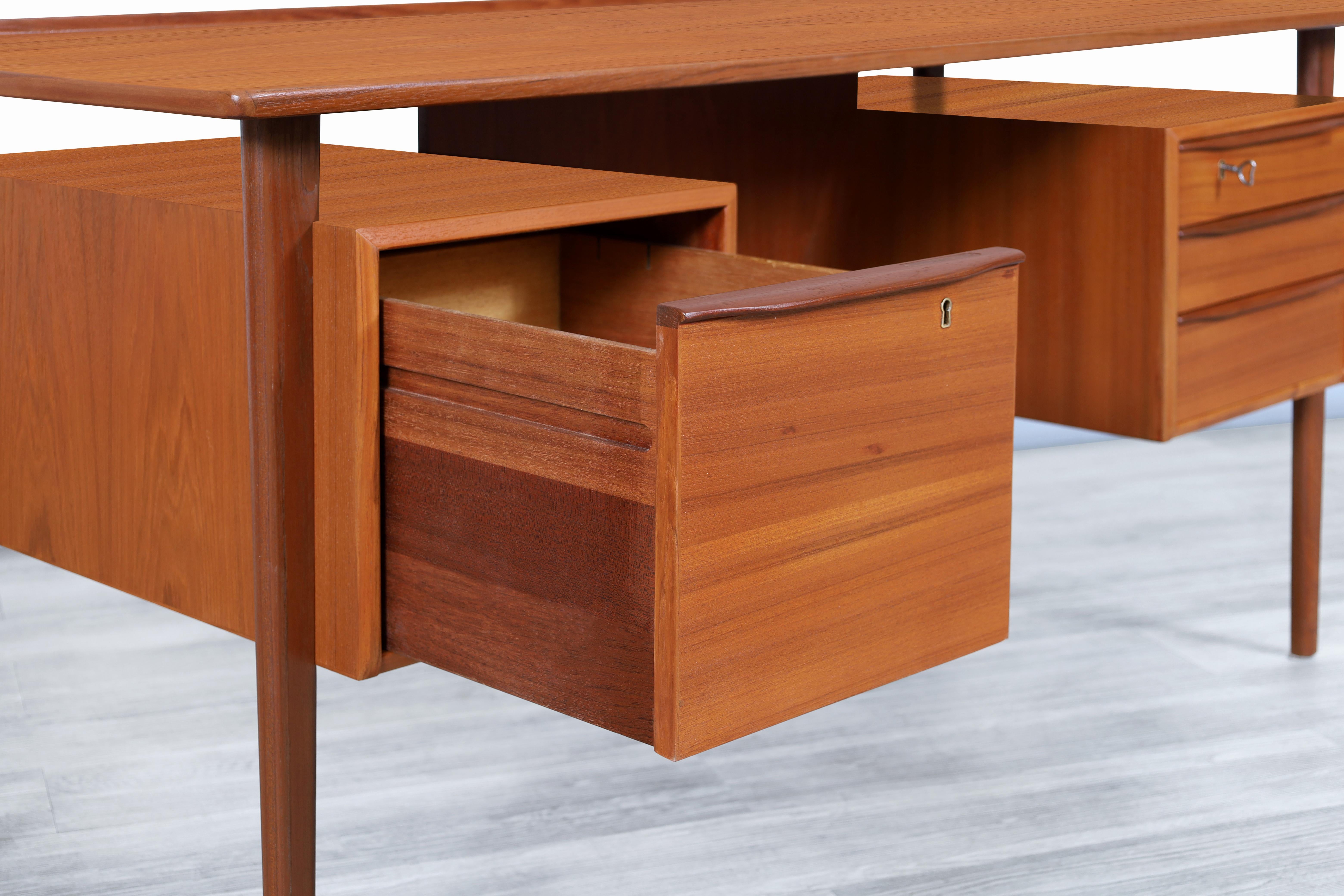 Mid-20th Century Danish Modern Floating Top Teak Desk by Peter Løvig Nielsen