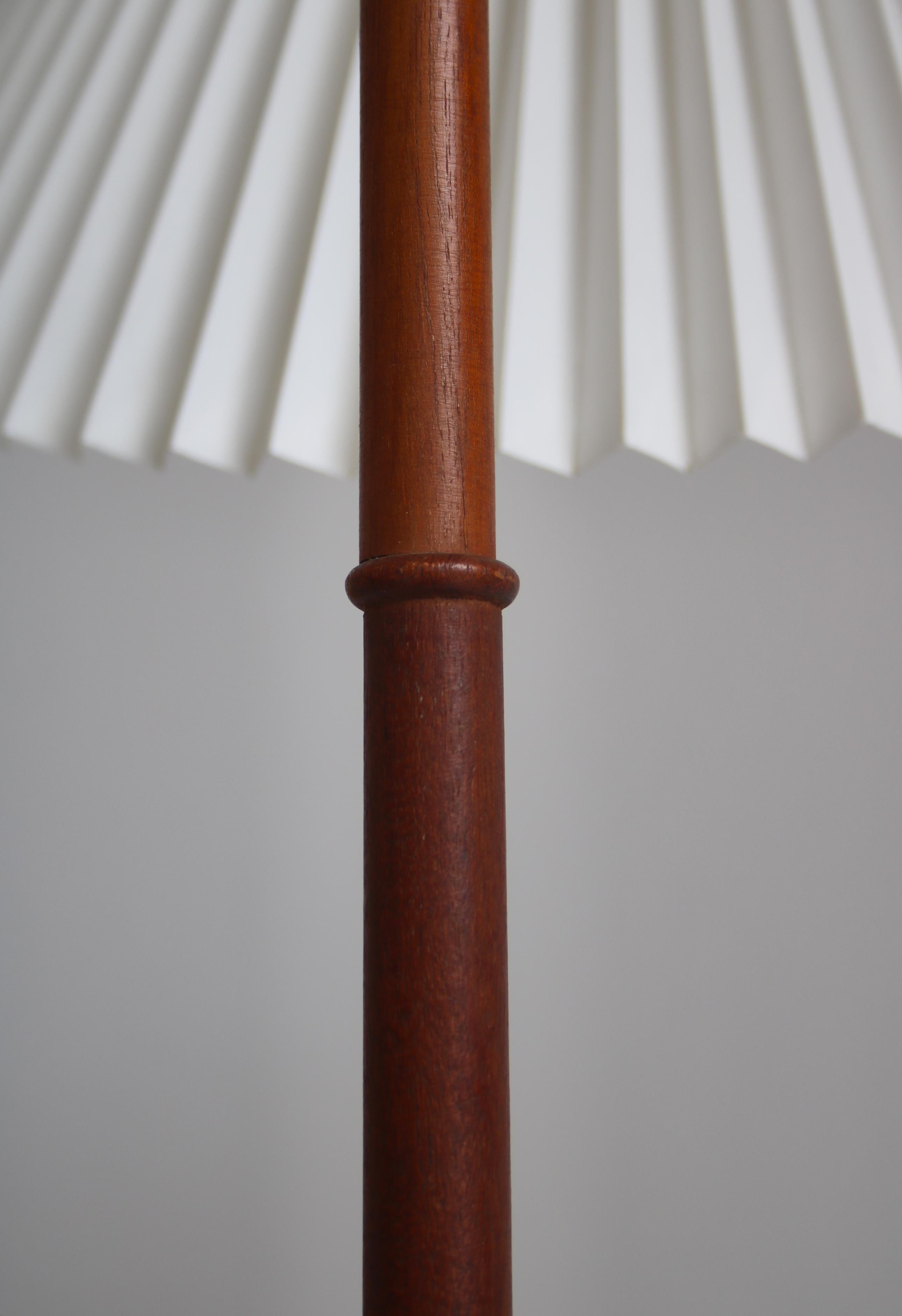 Iron Danish Modern Floor Lamp in Teak with Hand Folded Le Klint Shade, 1950s For Sale