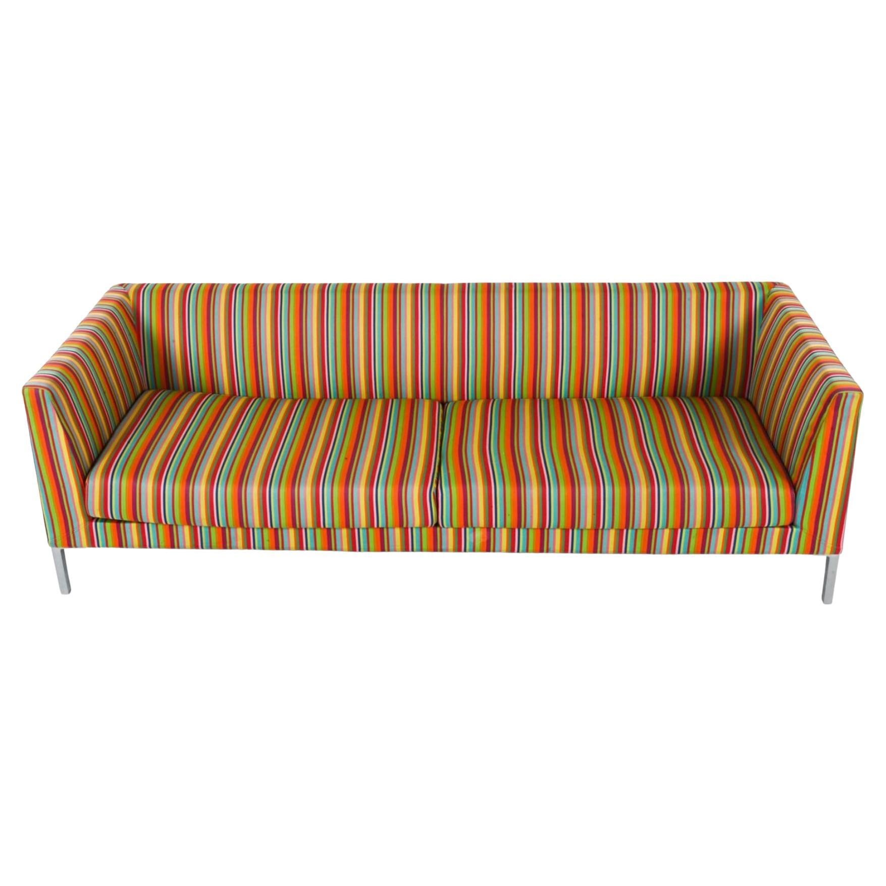 Danish Modern 3 seat long sofa from the Paustian Lounge Series designed by Johannes Foersom and Peter Hiort-Lorenzen for Tivoli and Paustian. This Modern sofa has satin-finished aluminum legs and a very colorful striped twill fabric. Manufacturing