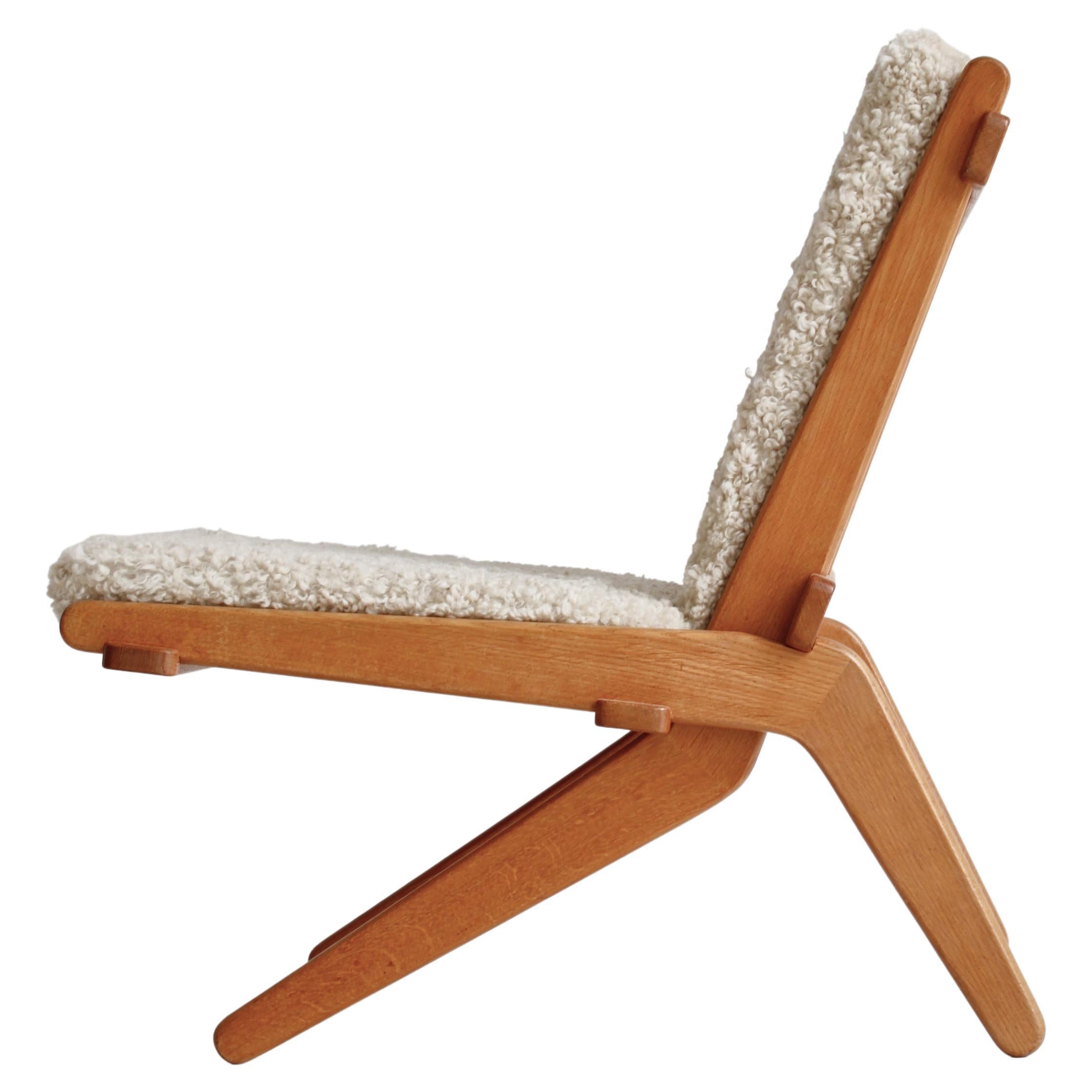 Chaise pliante moderne danoise en chêne et peau de mouton naturelle, Preben Thorsen, années 1950 en vente