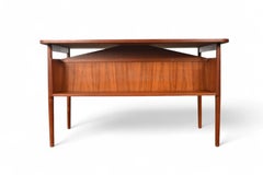 Danish Modern Four Drawer Mid Century Writing Desk in Teak