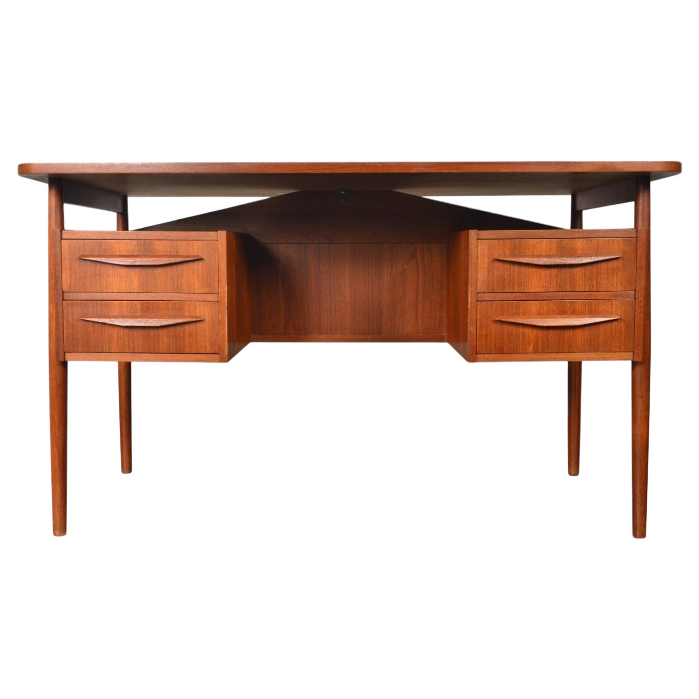 Danish Modern Four Drawer Mid Century Writing Desk in Teak