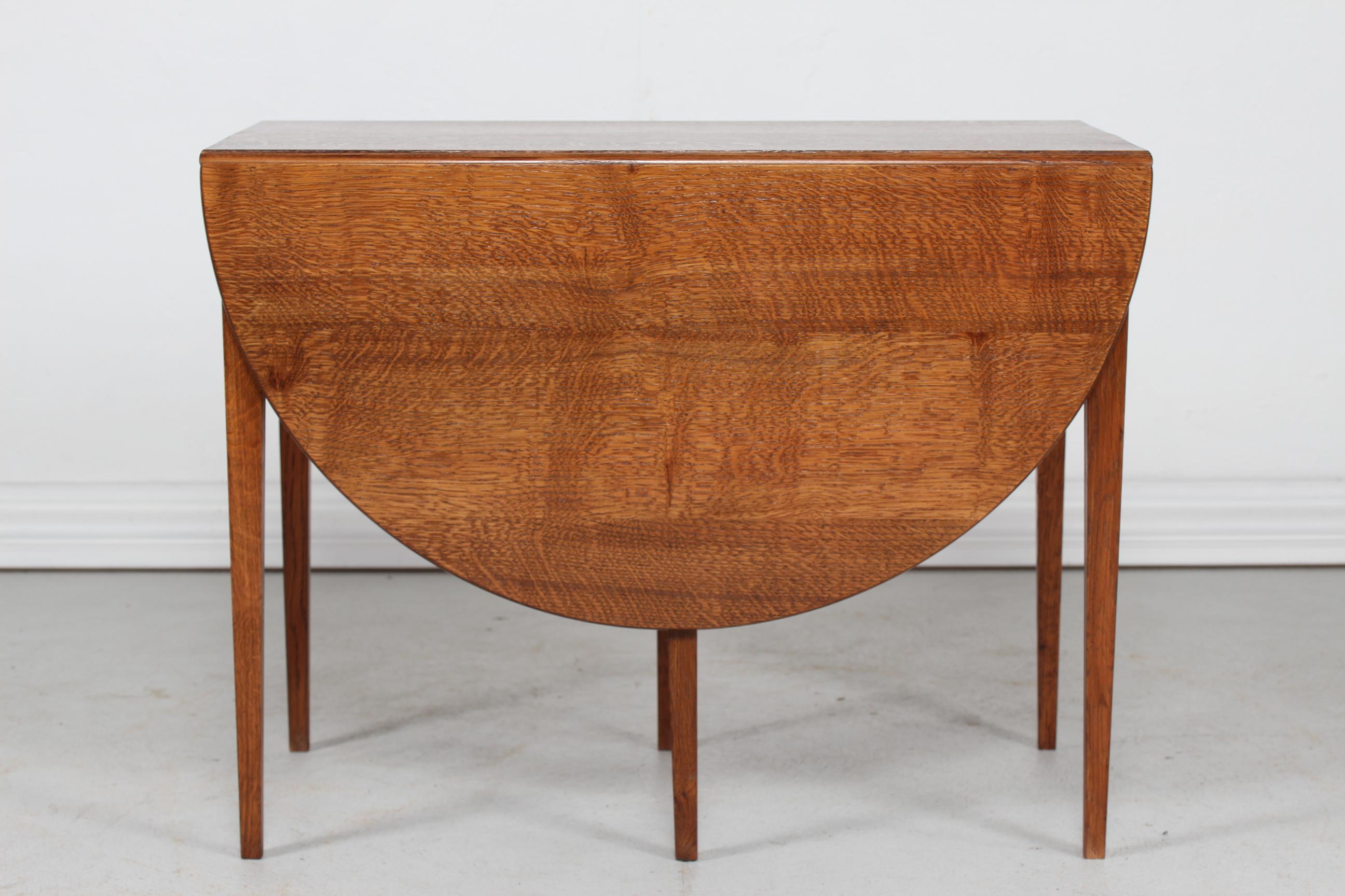 Mid-20th Century Danish Modern Frits Henningsen Coffee Table of Solid Oak with Two Flaps, 1950s