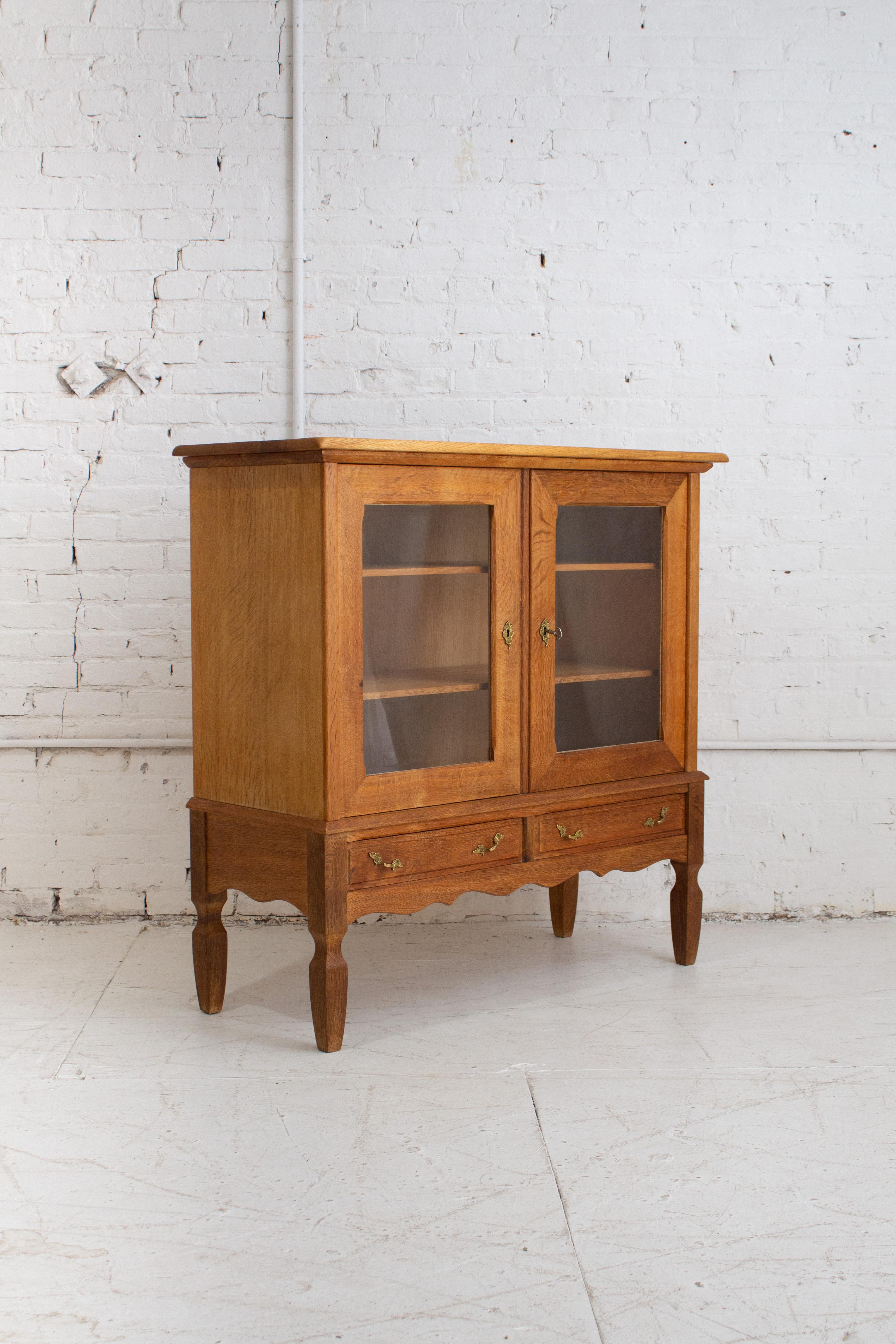 Danish Modern Glass Front Oak Cabinet Attributed to Henning Kjaernulf In Good Condition For Sale In Brooklyn, NY