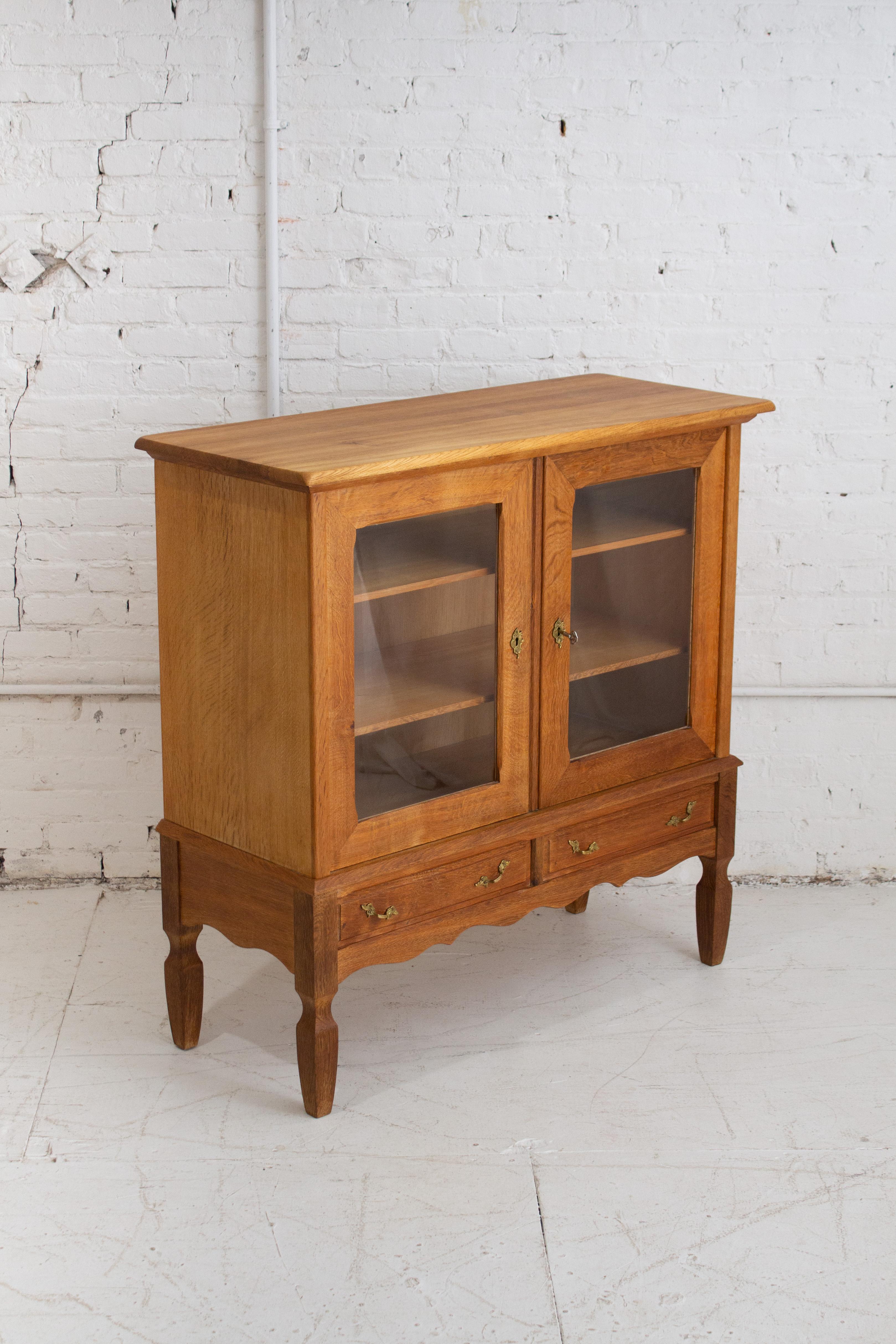 Late 20th Century Danish Modern Glass Front Oak Cabinet Attributed to Henning Kjaernulf For Sale