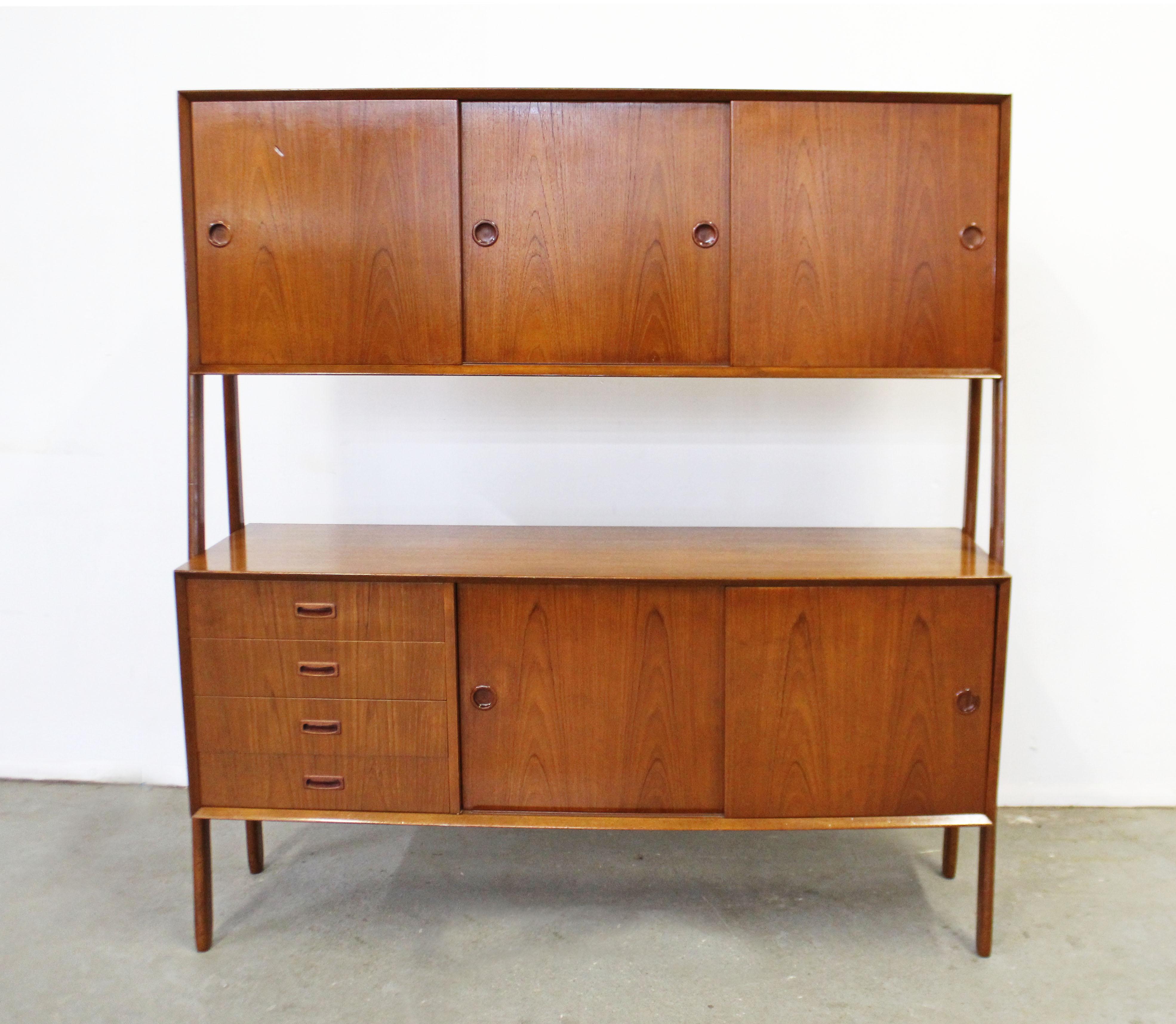 Danish Modern Gunni Omann Model 3 Two-Tier Teak Credenza 

Offered is a Danish Modern Gunni Omann Model 3 Two-Tier Teak Credenza . The behind the doors have shelves behind and are adjustable. In good condition, structurally sound with some minor