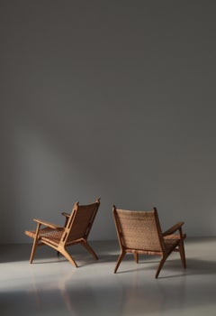Dänische Moderne Hans J. Wegner Lounge Stühle Model "CH-27" Eiche & Rattan, 1950er Jahre