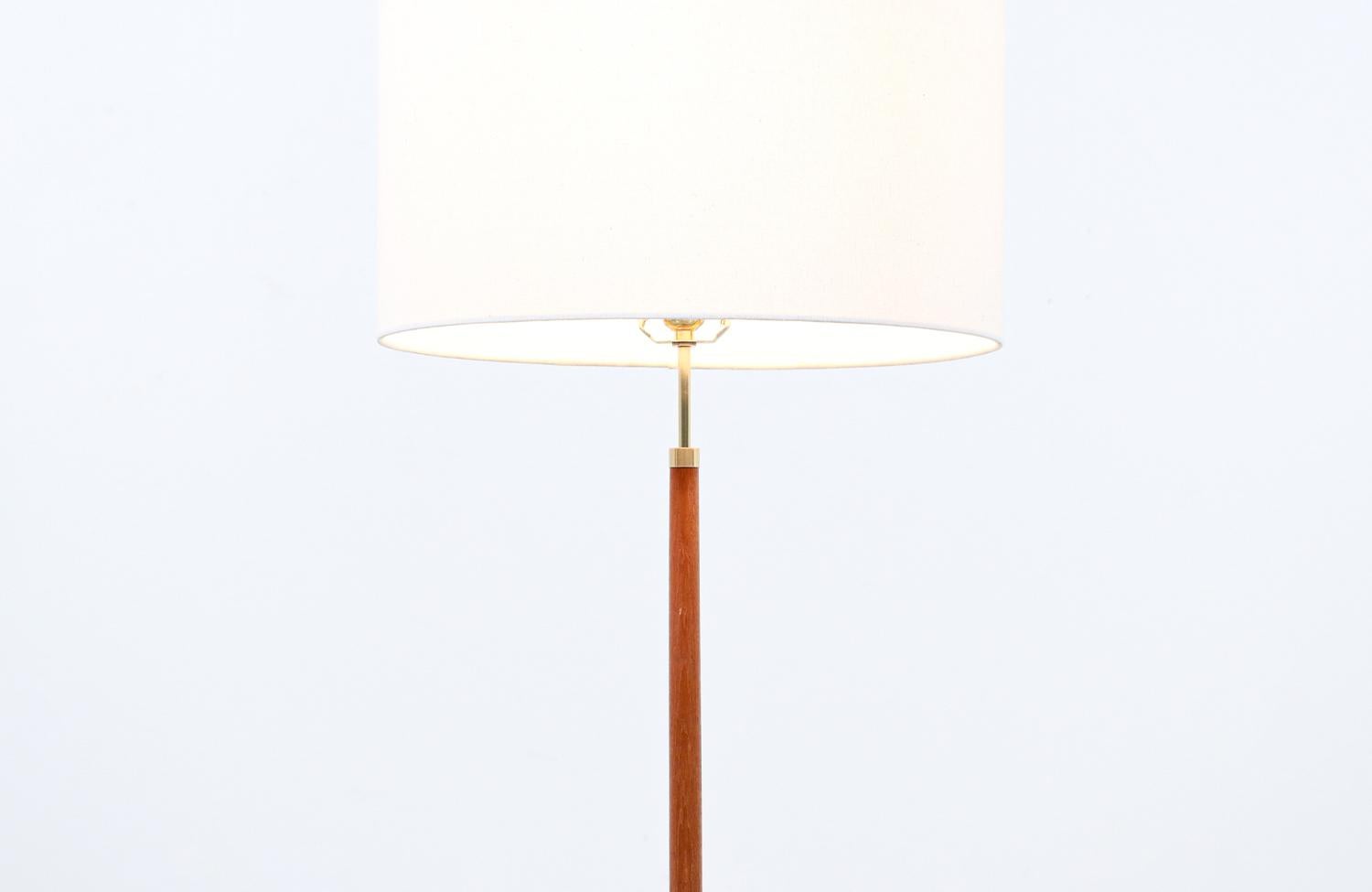 Mid-20th Century Danish Modern Height-Adjustable Teak Stem Floor Lamp with Iron Base