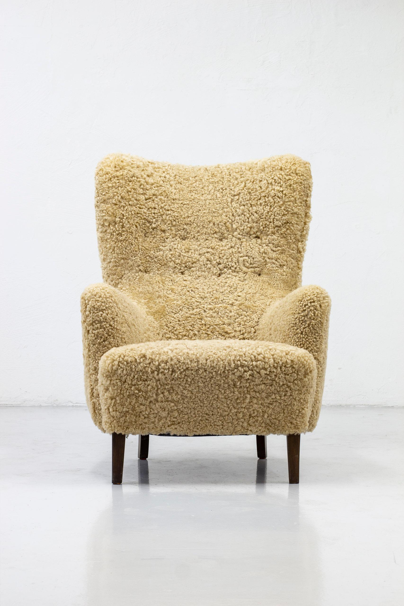 Danish Modern High Back Chair with Sheepskin Upholstery, Denmark, 1950s In Good Condition In Hägersten, SE