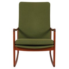 Danish Modern High Backed Teak Rocking Chair by Ole Wanscher