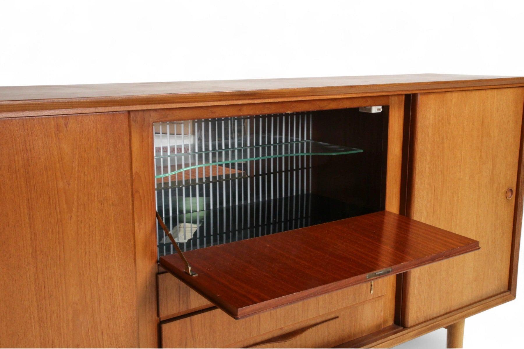 Danish Modern High Sideboard in Teak With Mirrored Dry Bar In Good Condition For Sale In Berkeley, CA