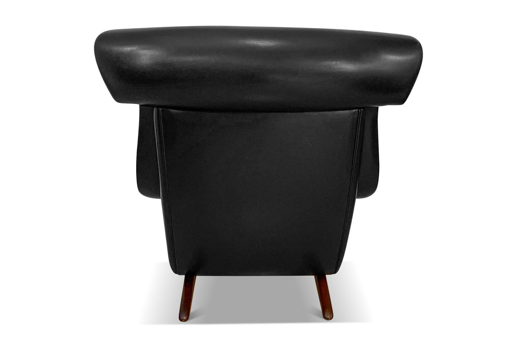 Mid-Century Modern Danish Modern High Wingback Lounge Chair in Black Vinyl For Sale