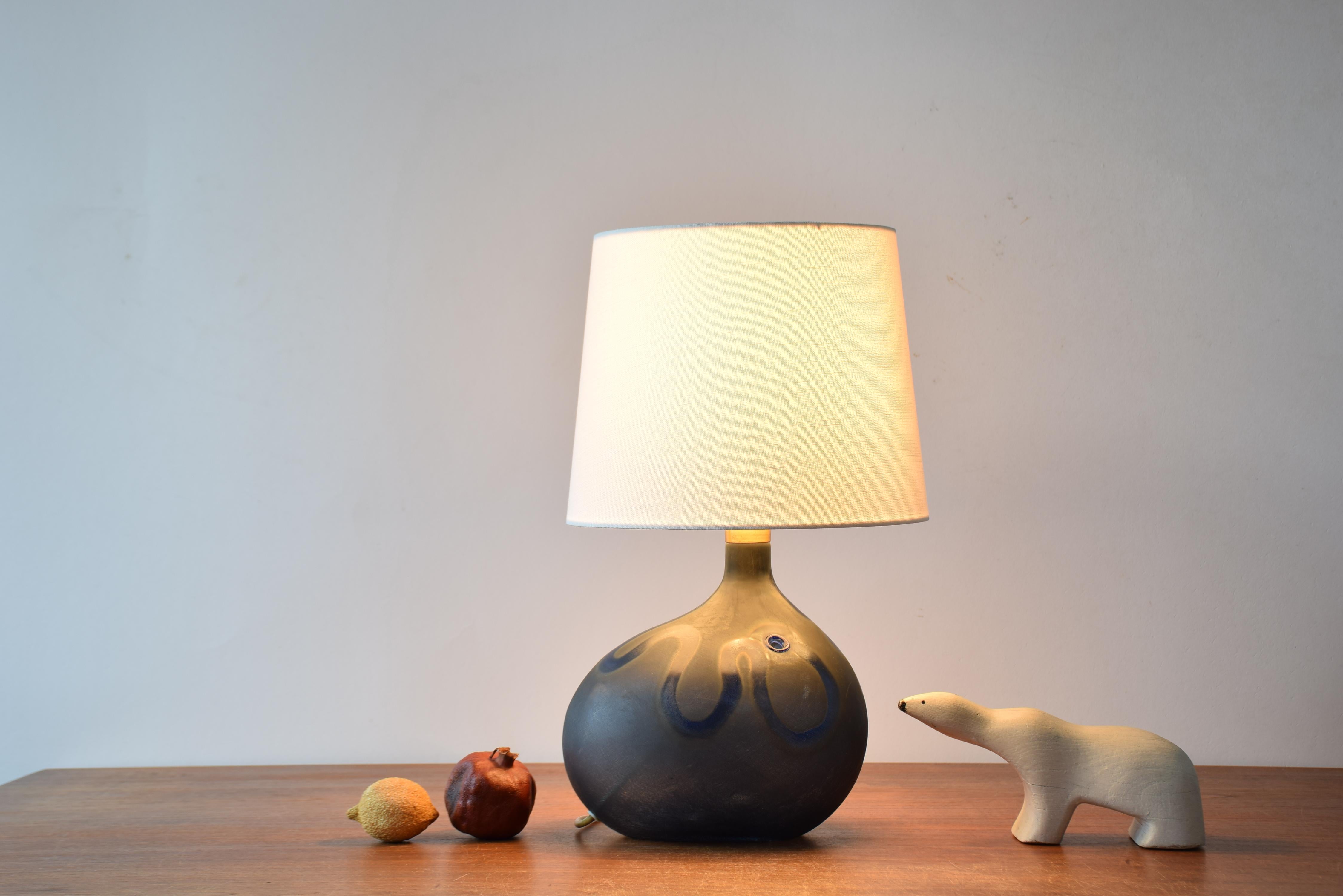 Danish Midcentury sculptural hand blown glass lamp designed by Michael Bang and made by Holmegaard. It´s from the series 