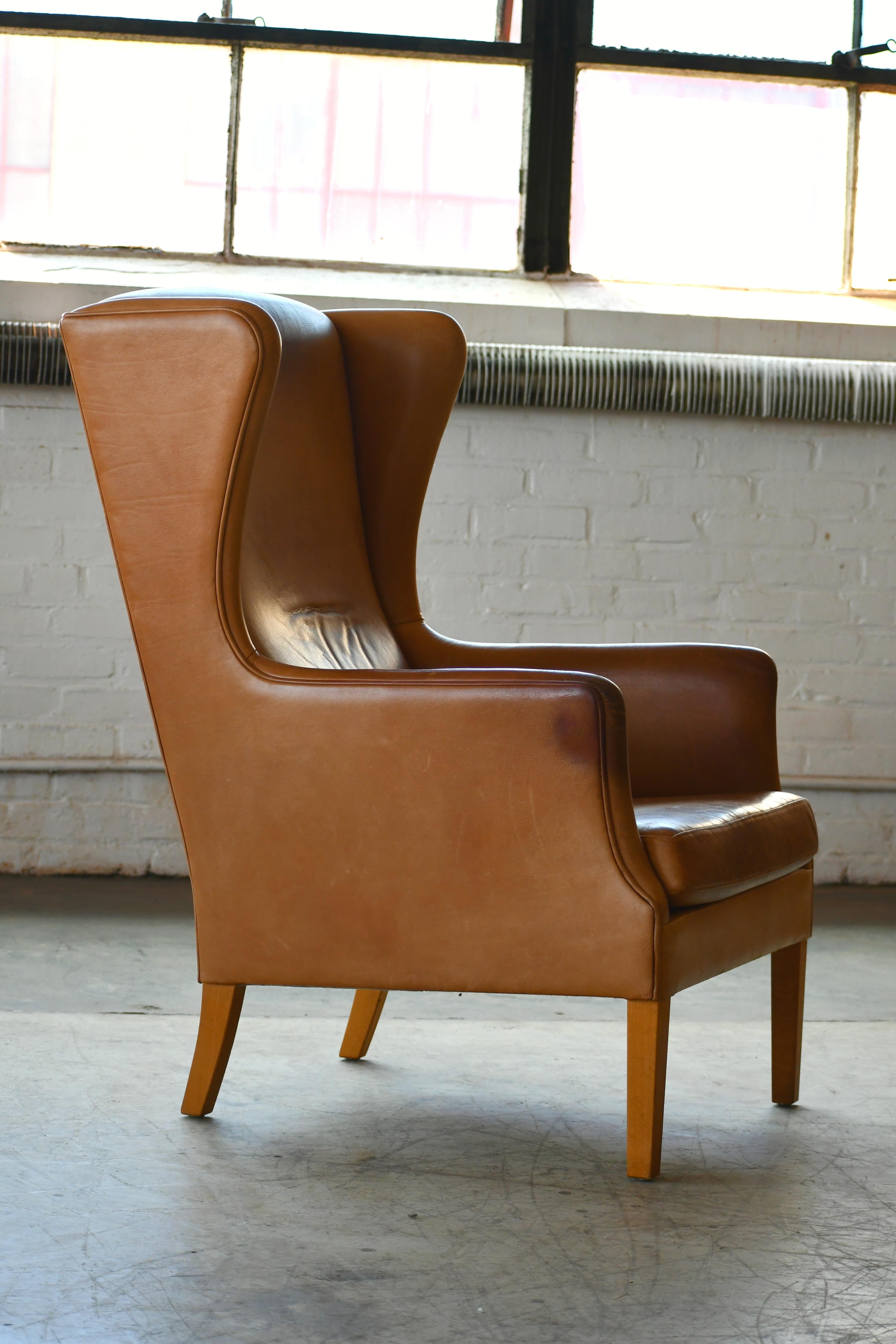 tan leather wingback chair