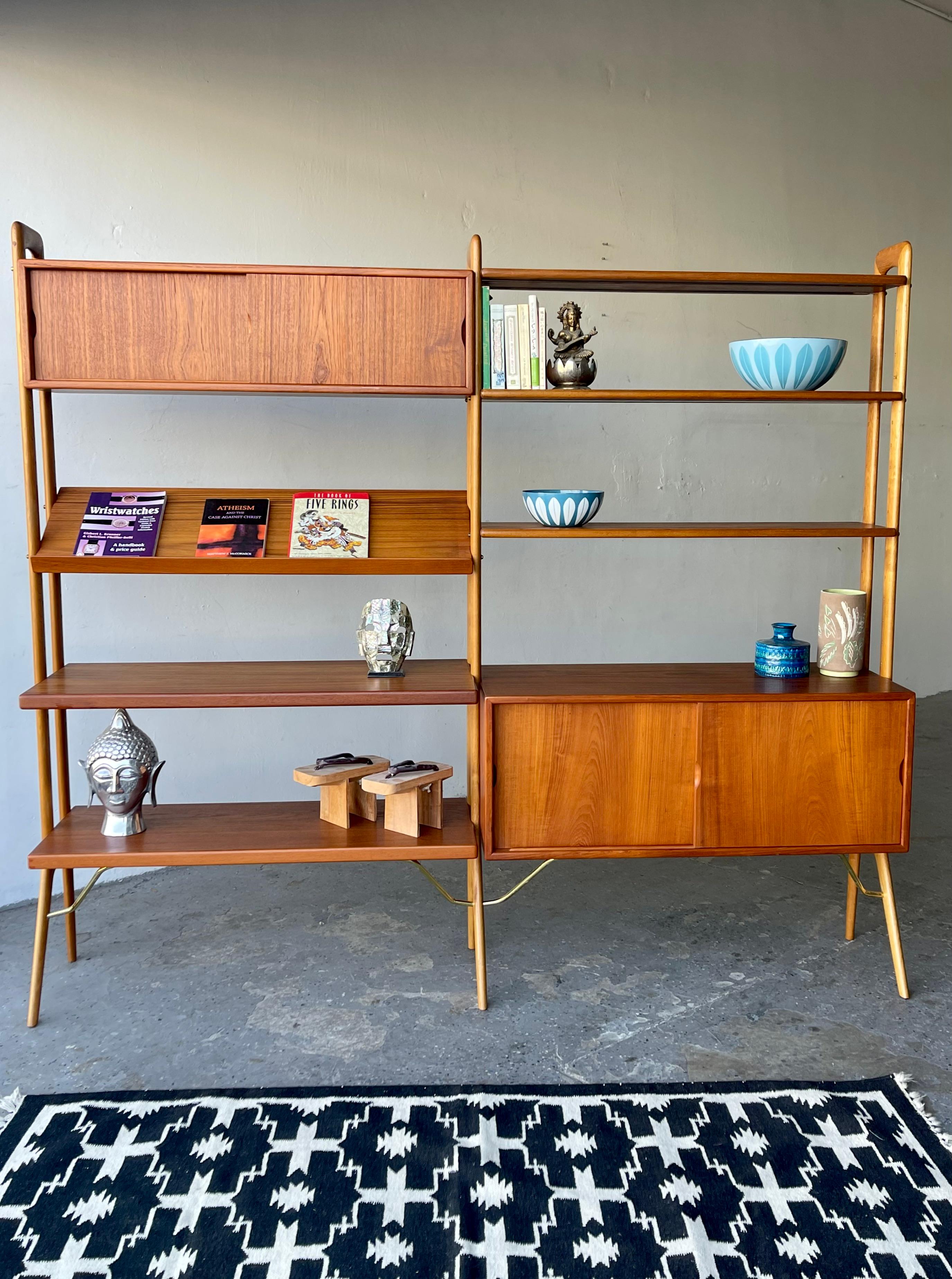 Wall unit or room divider by Kurt Ostervig for KP Mobler. Beautiful teak system is fully finished on the front and back, allowing for use as a room divider. It also modular can add or re-arrange shelves & cabinets , Gorgeous teak grain & sculpted