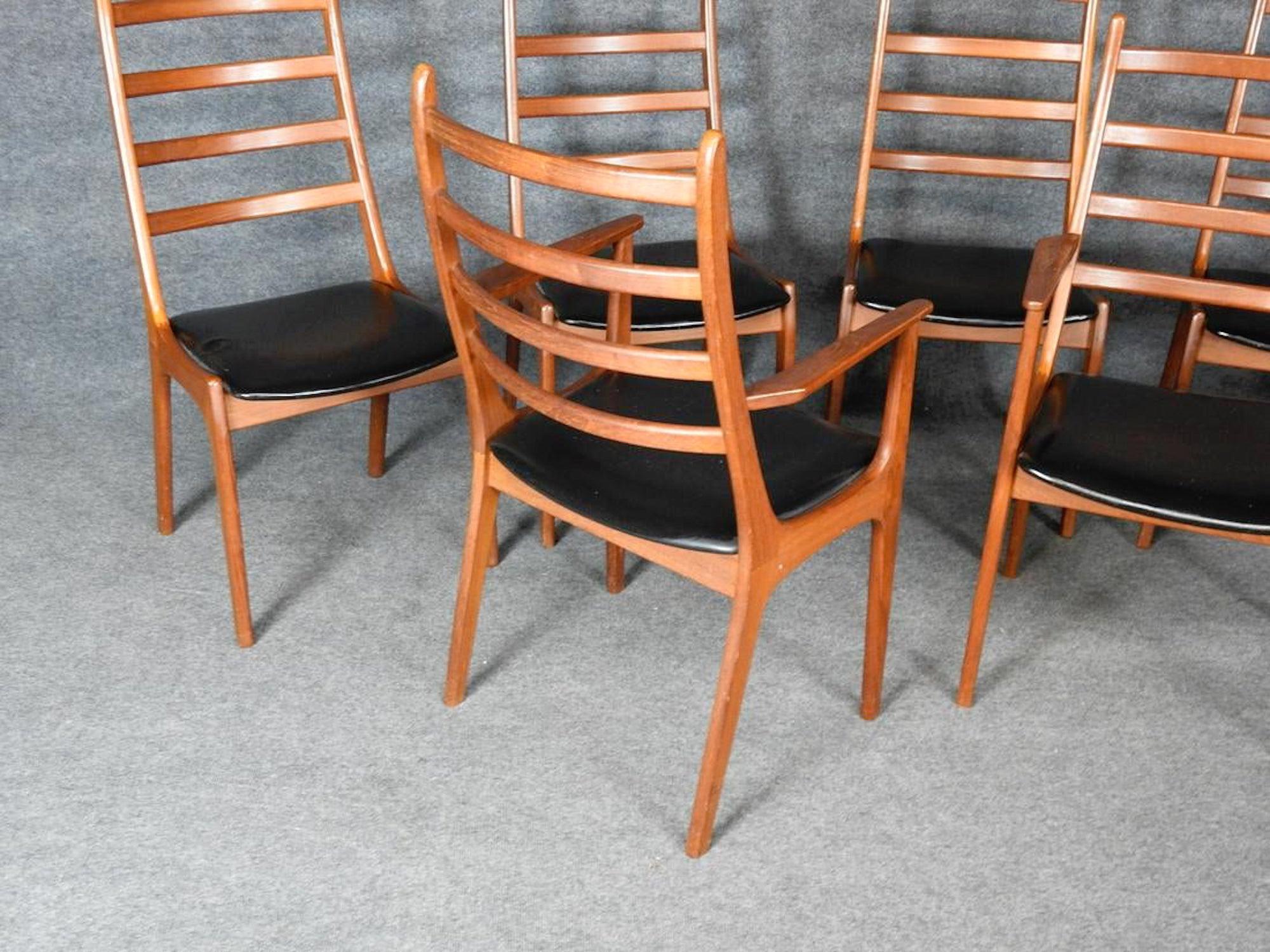 Set of six Mid-Century Modern dining chairs with curved back.
(Please confirm item location - NY or NJ - with dealer).
    