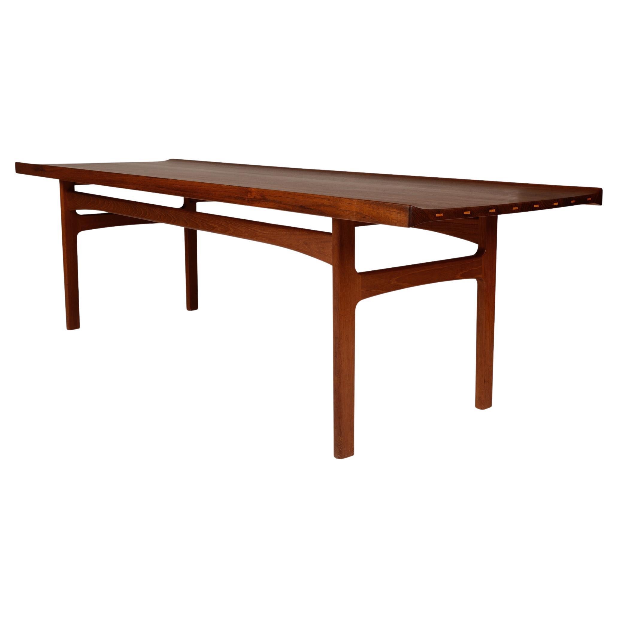 Danish modern larger teak coffee table with contrasting birch details For Sale