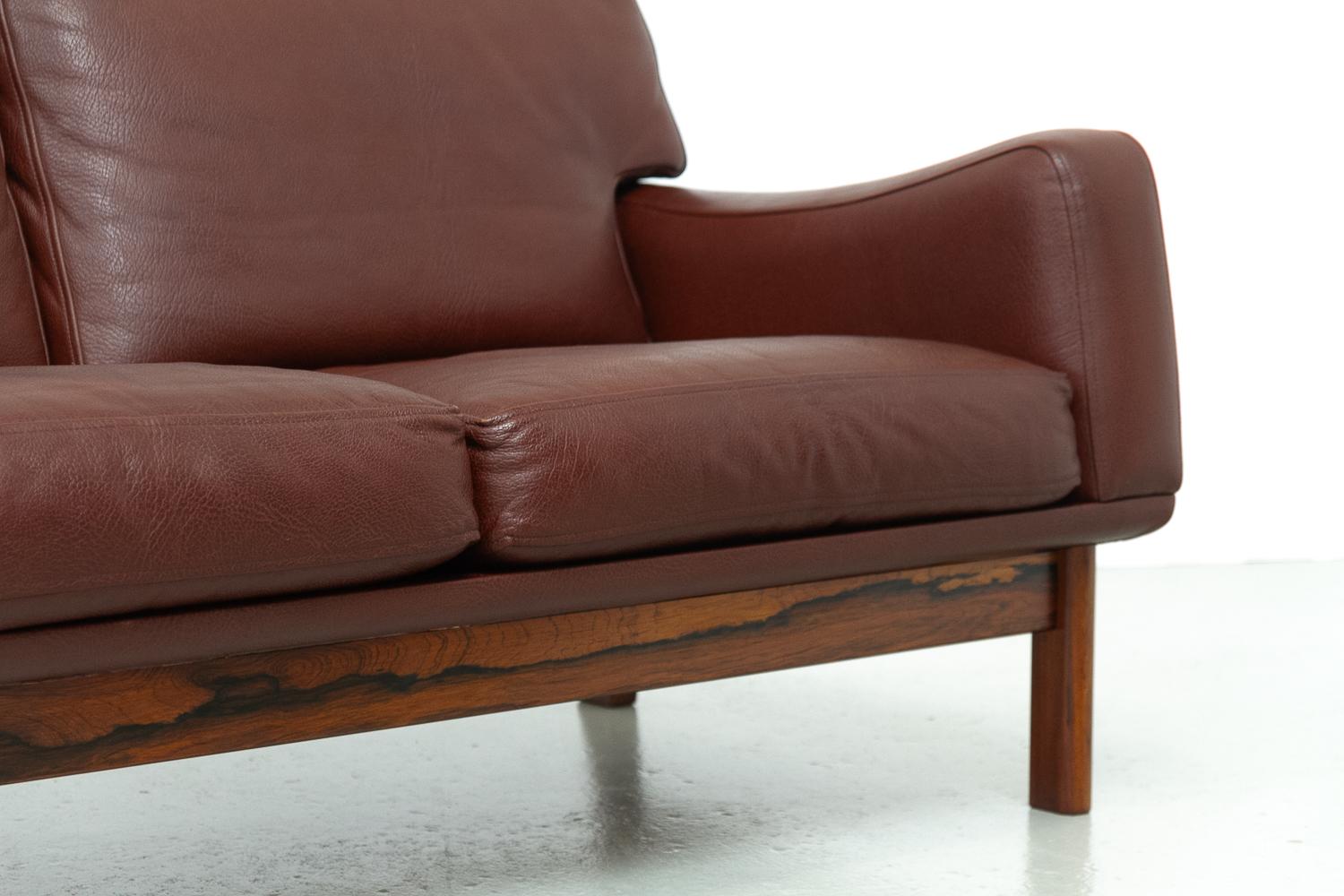 Mid-20th Century Danish Modern Leather and Rosewood Sofa by Eran, 1960s. For Sale